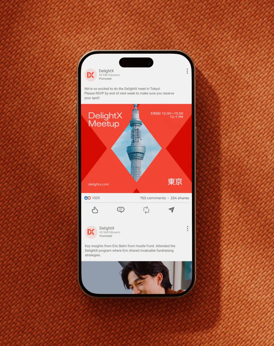 Smartphone displaying a social media feed with two posts by DelightX. The top post promotes a DelightX Meetup in Tokyo with a photo of the Tokyo Skytree inside a red diamond shape and details of the event date and time. Below it, a post shares key insights from Eric Bahn of Hustle Fund about fundraising strategies with a small photo of a man with dark hair smiling.