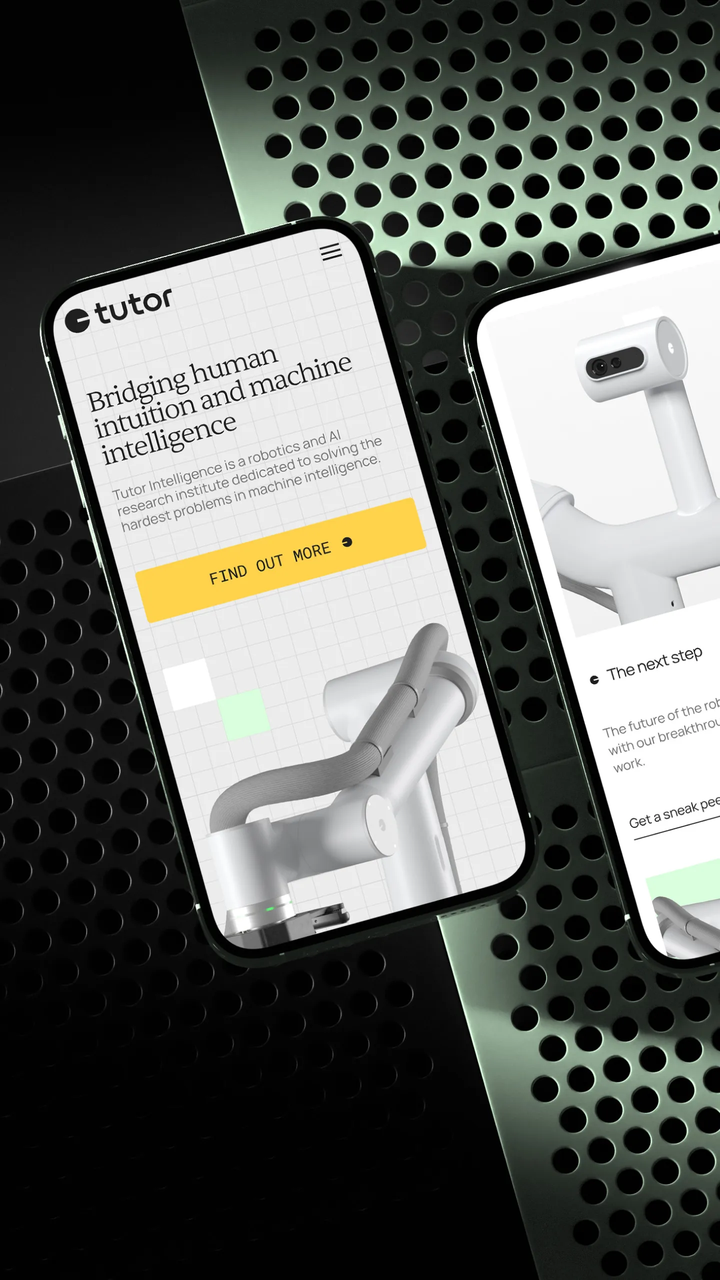 Smartphone screen showing a webpage for Tutor Intelligence, a robotics and AI research institute with a yellow 'FIND OUT MORE' button and an image of a robotic arm, against a background with perforated black and green surfaces.