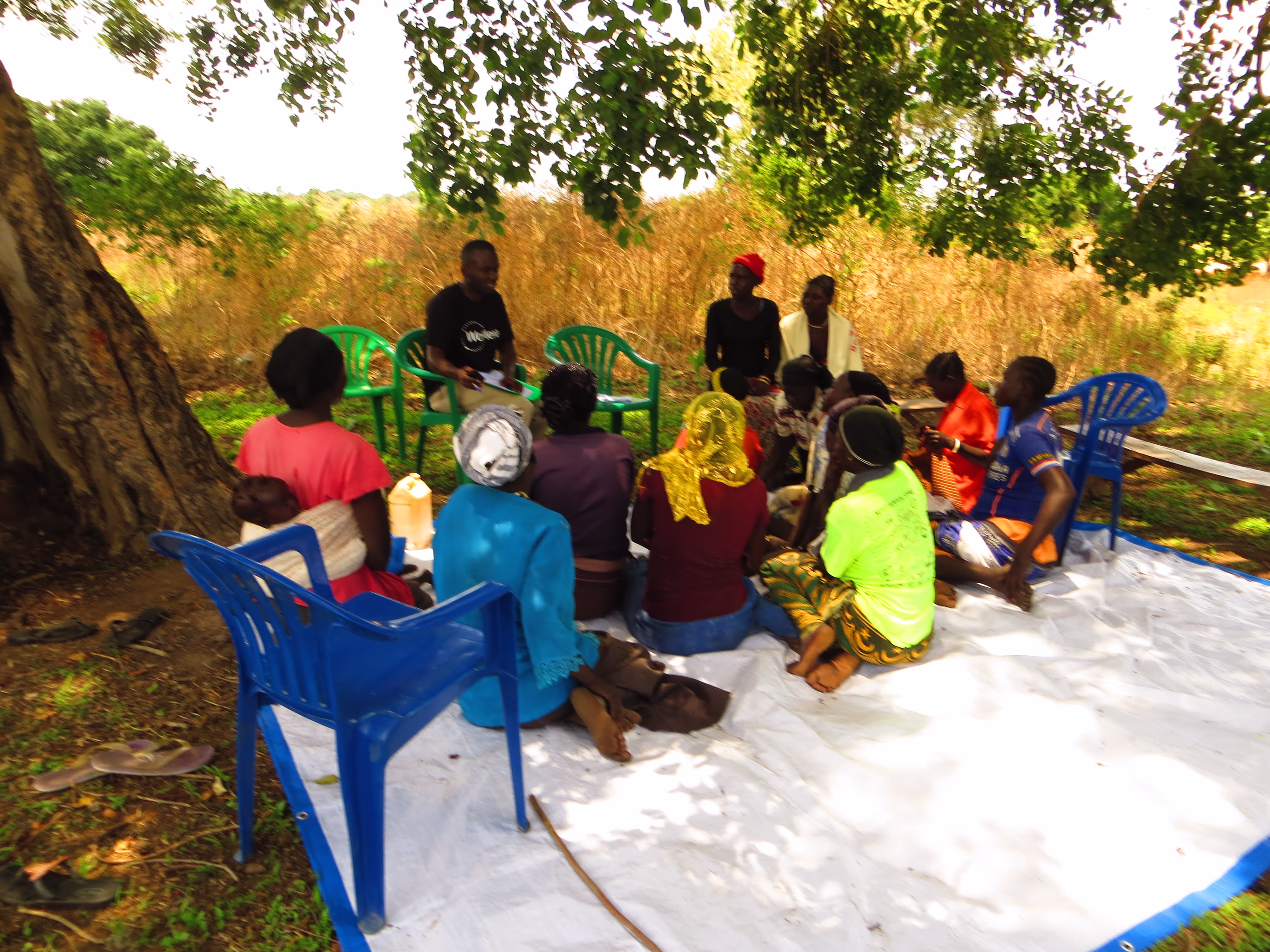 Focus Group discussion led by one of WoMena’s trainers at the community health clubs in the refugee host villages . (Photo credit: WoMena Uganda)