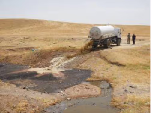 Sludge being dumped into an open water body close to a community in the Kurdish Region of Iraq. Credit: BORDA