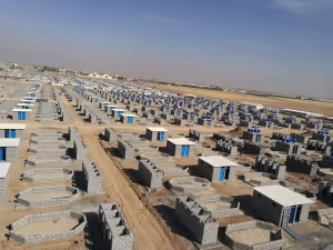 An image showing when 480 Syrian Refugee plots were being built at Qushtapa Camp, outside Erbil City, Kurdistan Region of Iraq