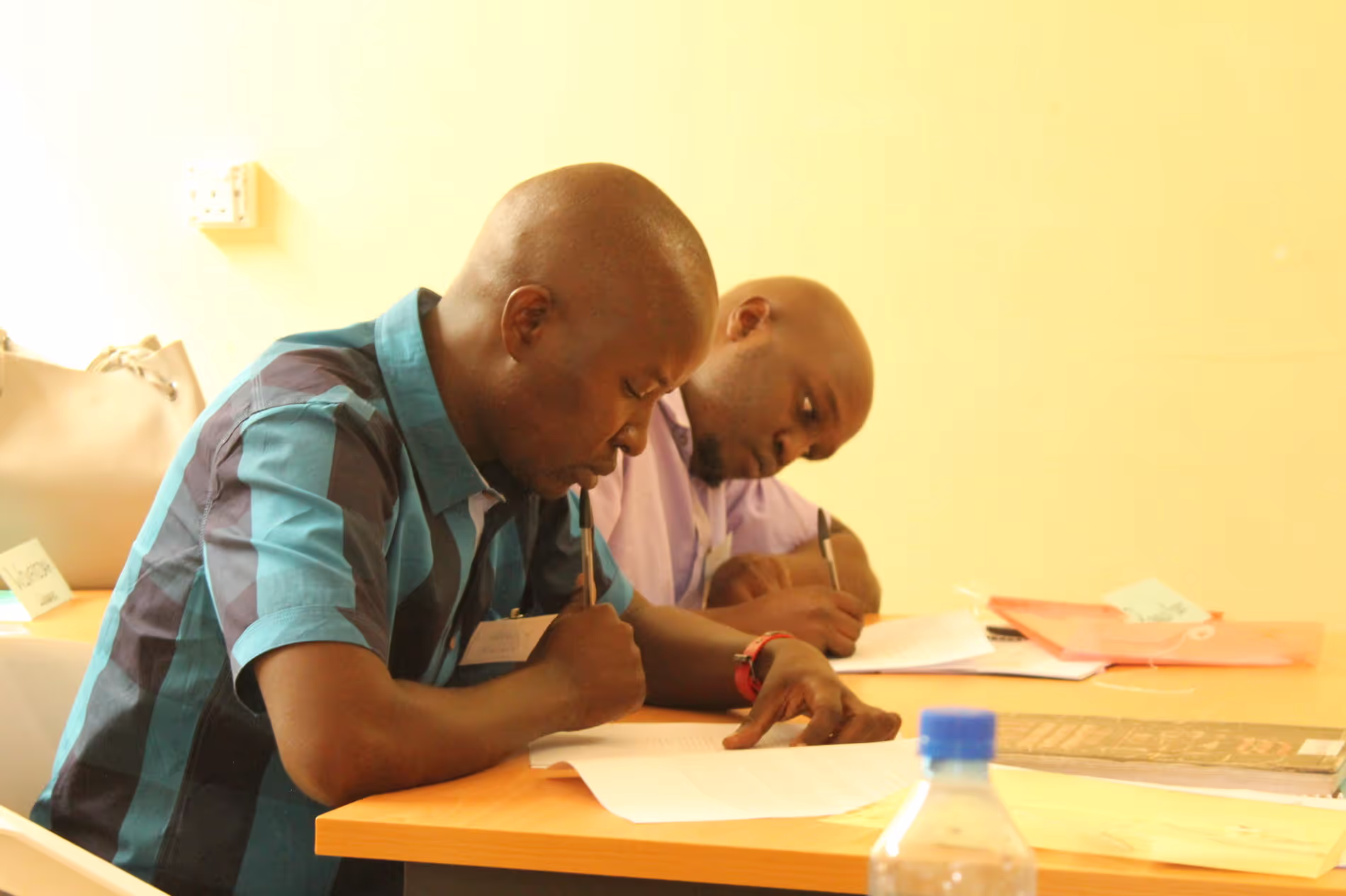 Future ESM-Ketamine providers complete a test during ESM-Ketamine training week