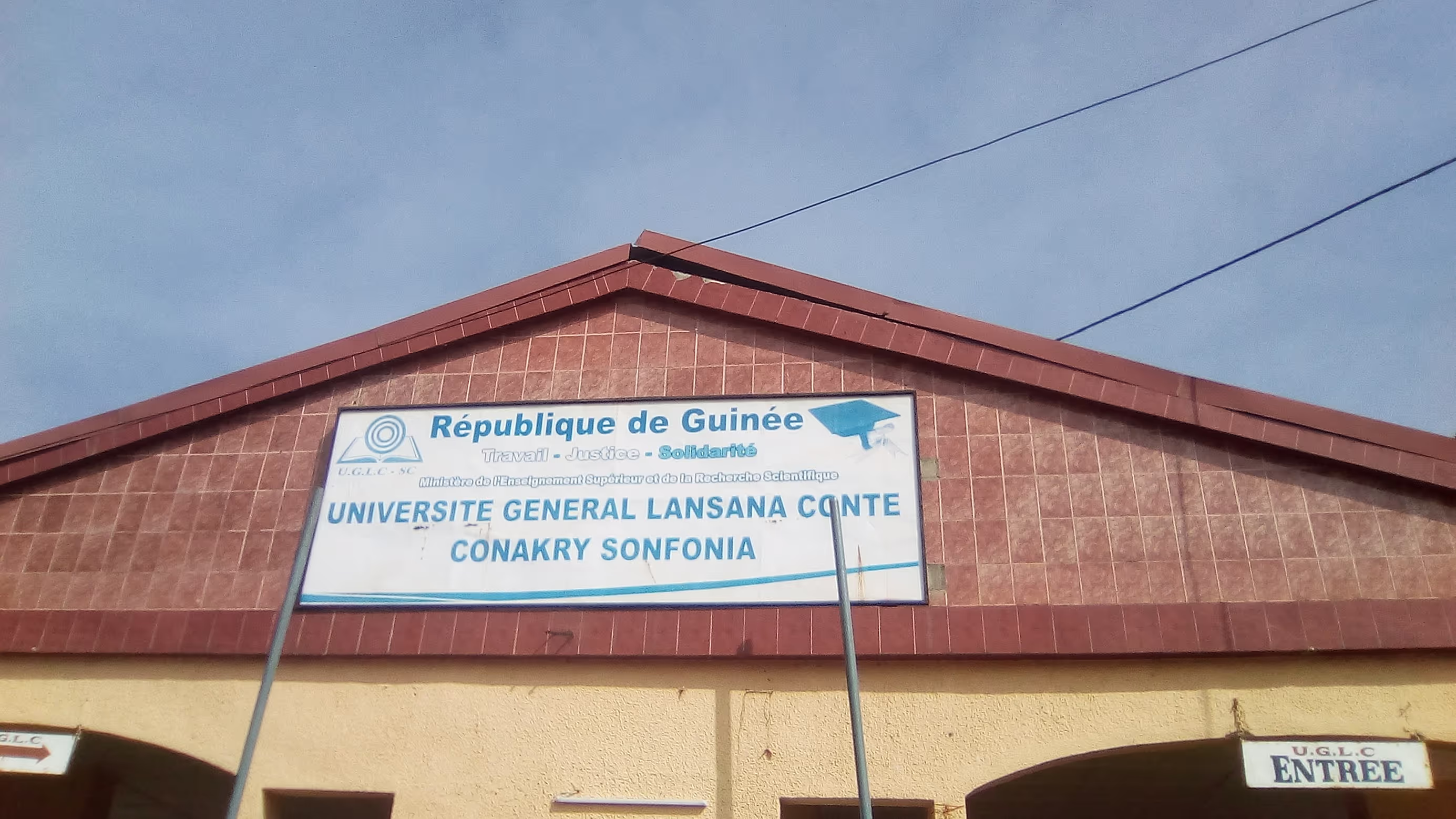 Main entrance to the Université Général Lansana Conté - Conakry Sonfonia. A part of Guinea's public university network, the UGLC-CS is dedicated to research and education in the social science, humanities, business and legal fields.
