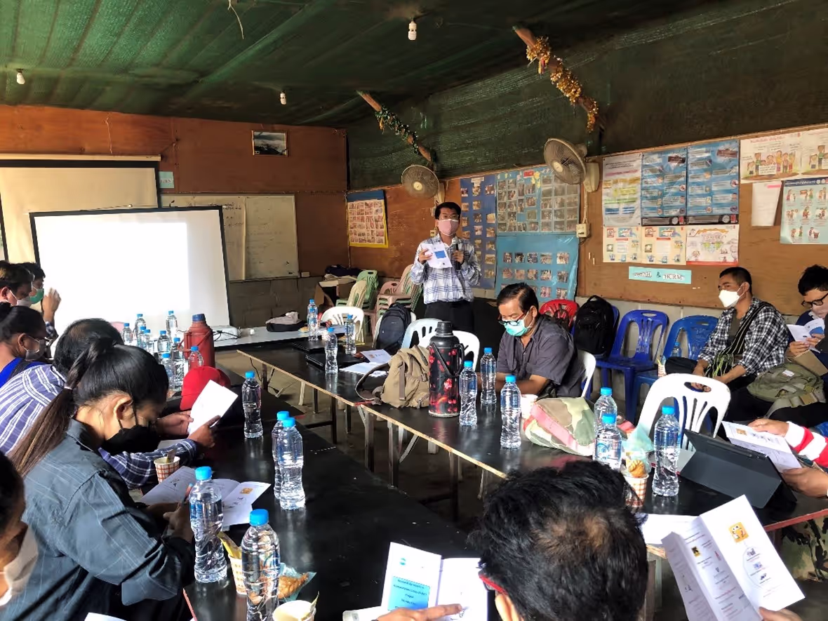 Introducing R2HC Project and Sharing R2HC Pamphlet in Camp Health Committee Meeting (18.Feb.2022). Photo: IRC