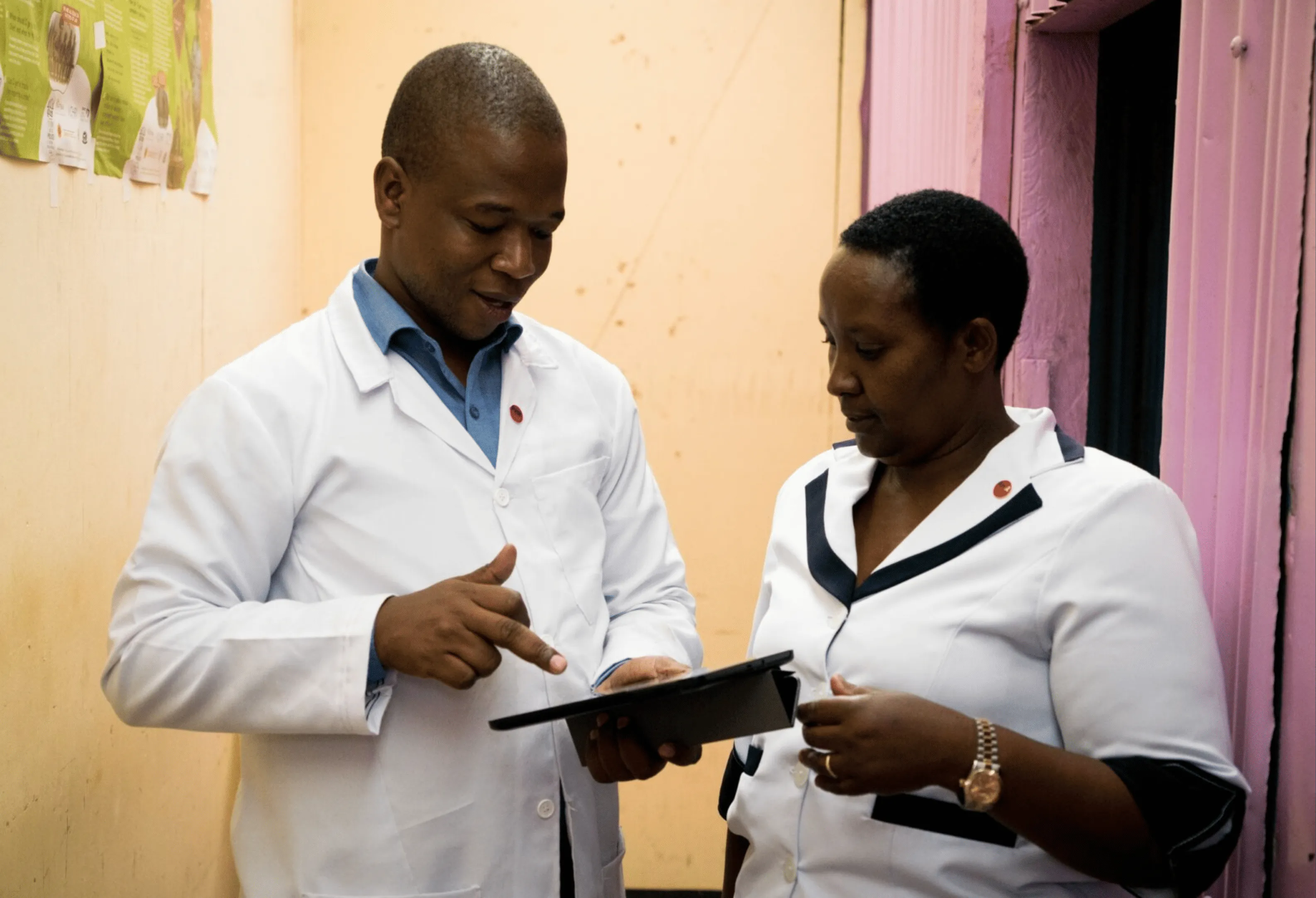 Two health workers testing MediCapt. Photo by Adriane Ohanesian / Physicians for Human Rights.
