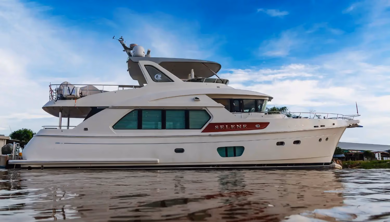 Long-range trawlers like this luxurious Selene yacht offer spacious decks, advanced navigation, and efficient fuel capacity for extended voyages.