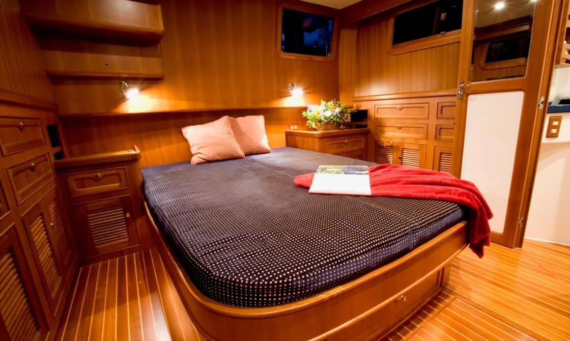 42 archer cozy wooden cabin bedroom with bed and soft lighting