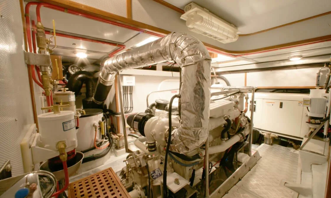 42 archer well lit industrial room with metallic pipes machinery