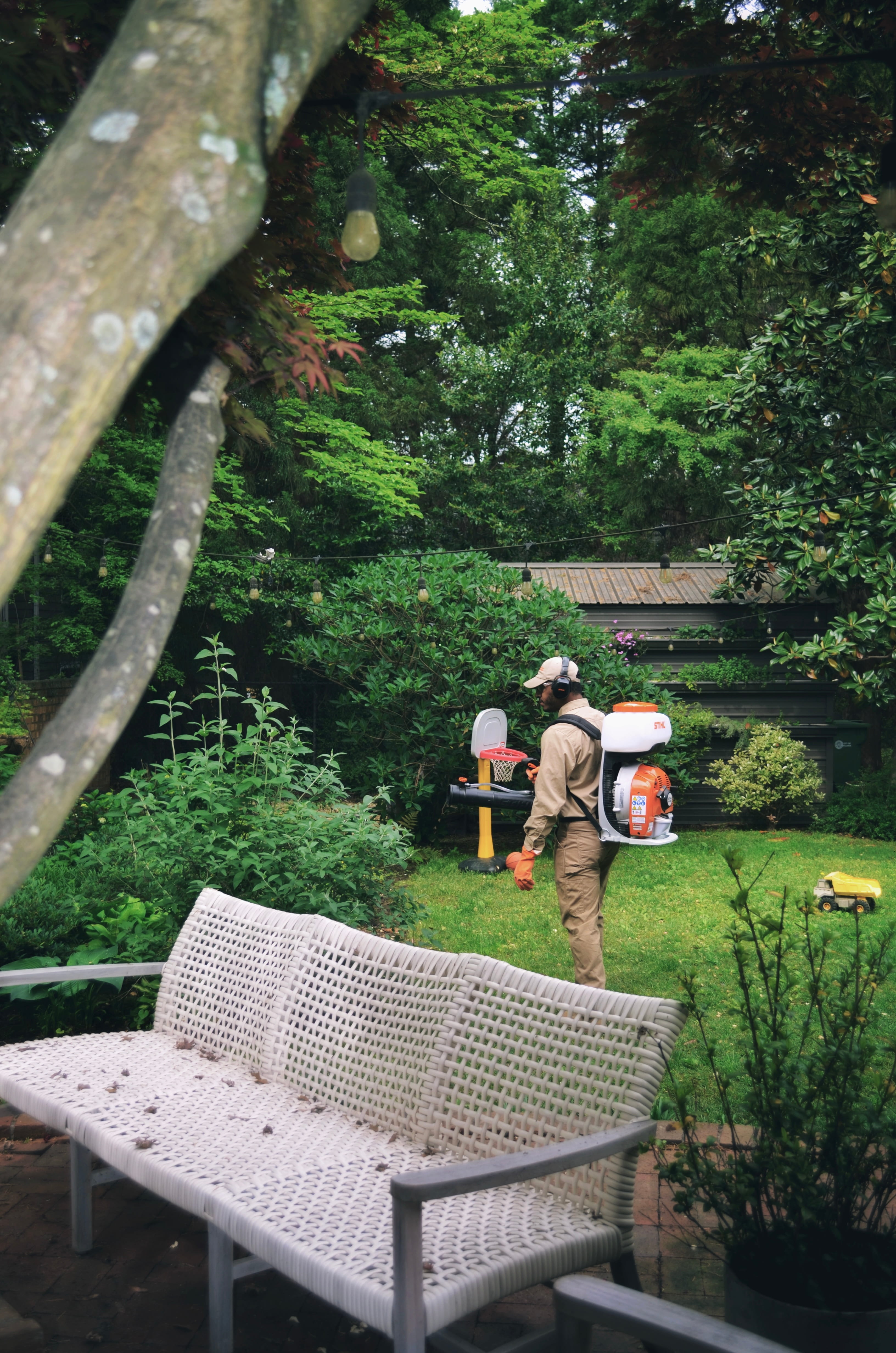 Technician treating a garden
