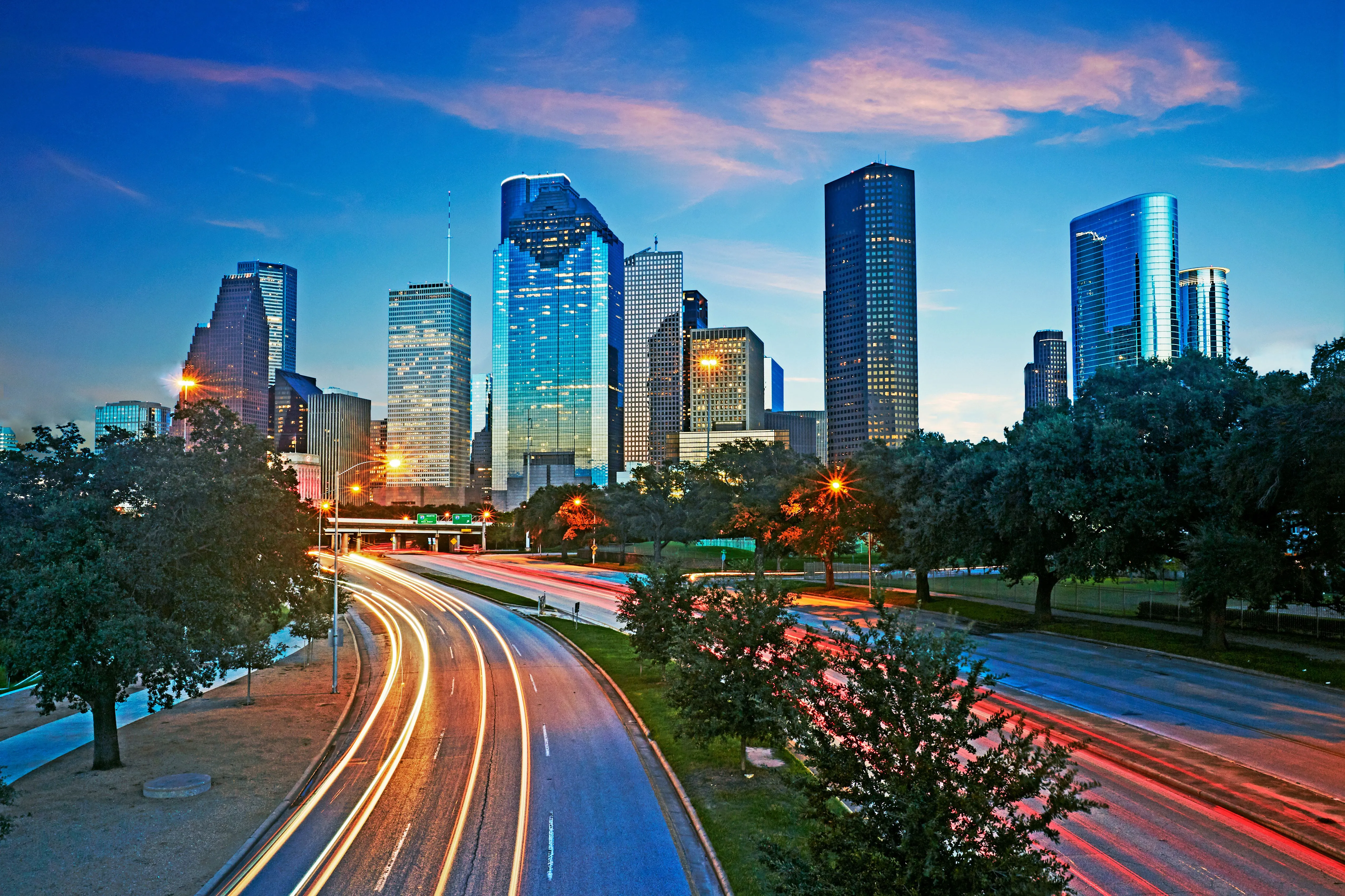 Houston skyline at twilight with blurred traffic lights and modern skyscrapers