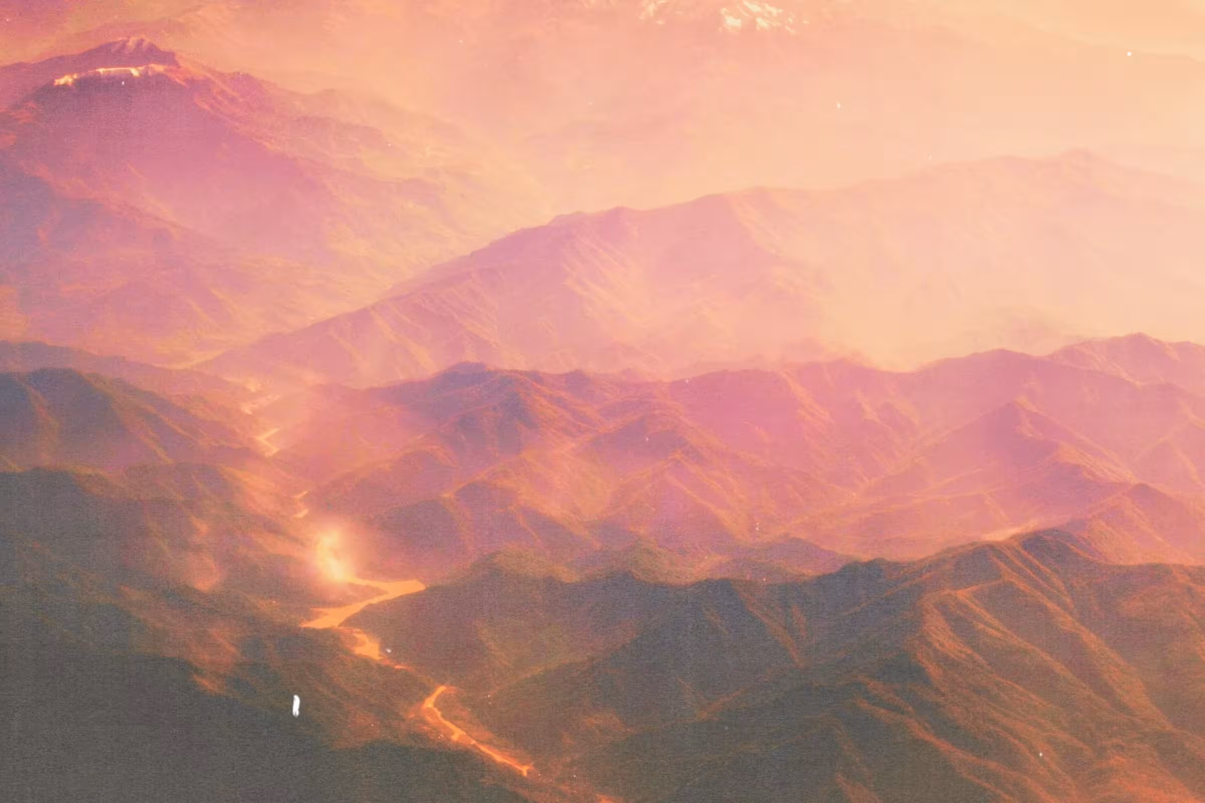 Close up of burning fire ripping through a canyon