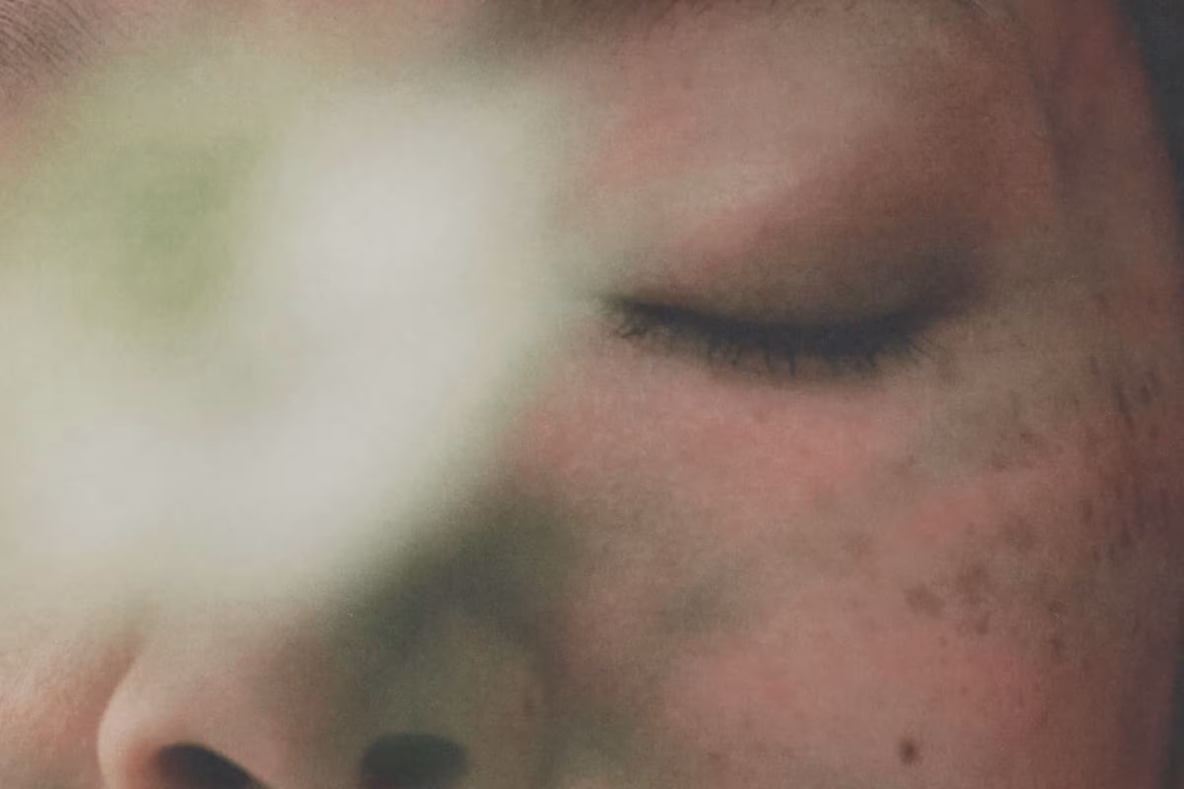 A woman with her eye closed contemplating if she can get an STD without having sex