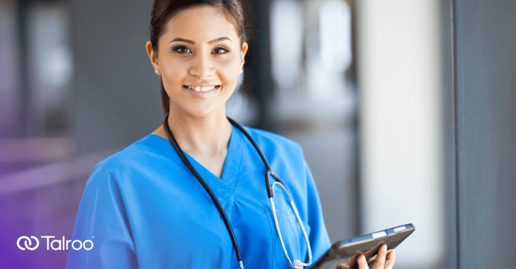 Doctor holding tablet.