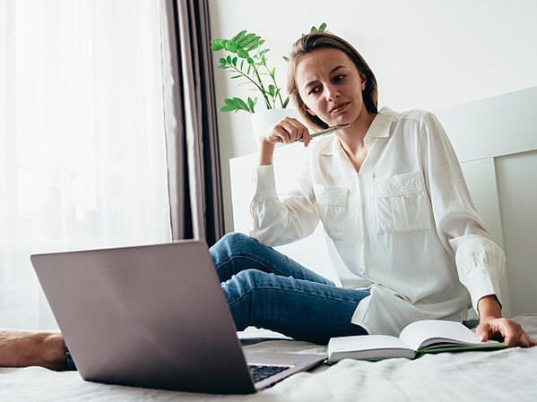Recruiter looking at laptop.