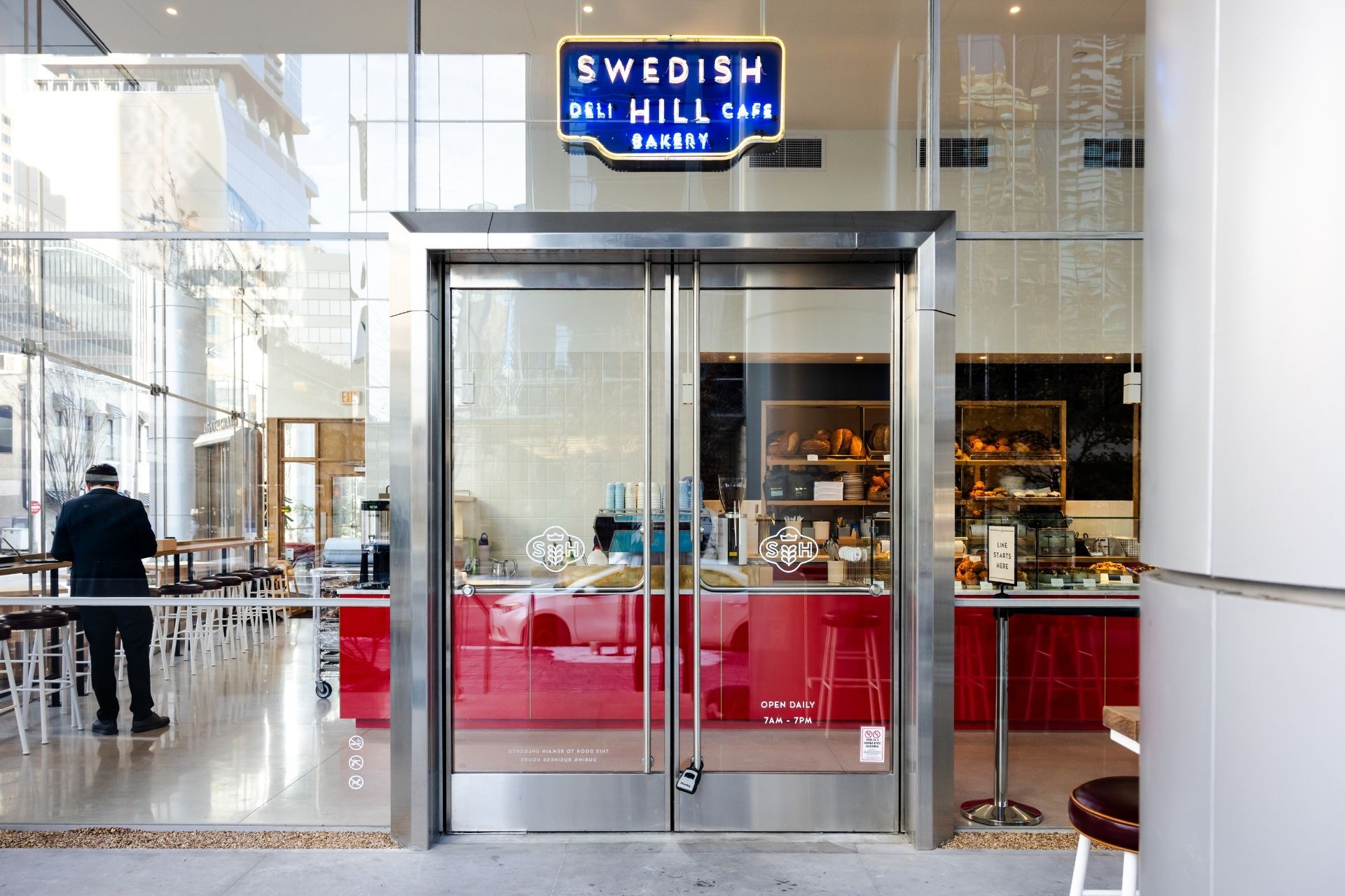 Entrance to Swedish Hill Downtown featuring floor to ceiling windows and doors with natural light filling the space