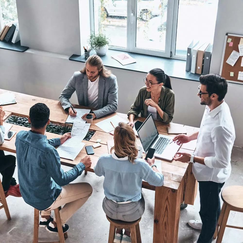 A bunch of people having a meeting