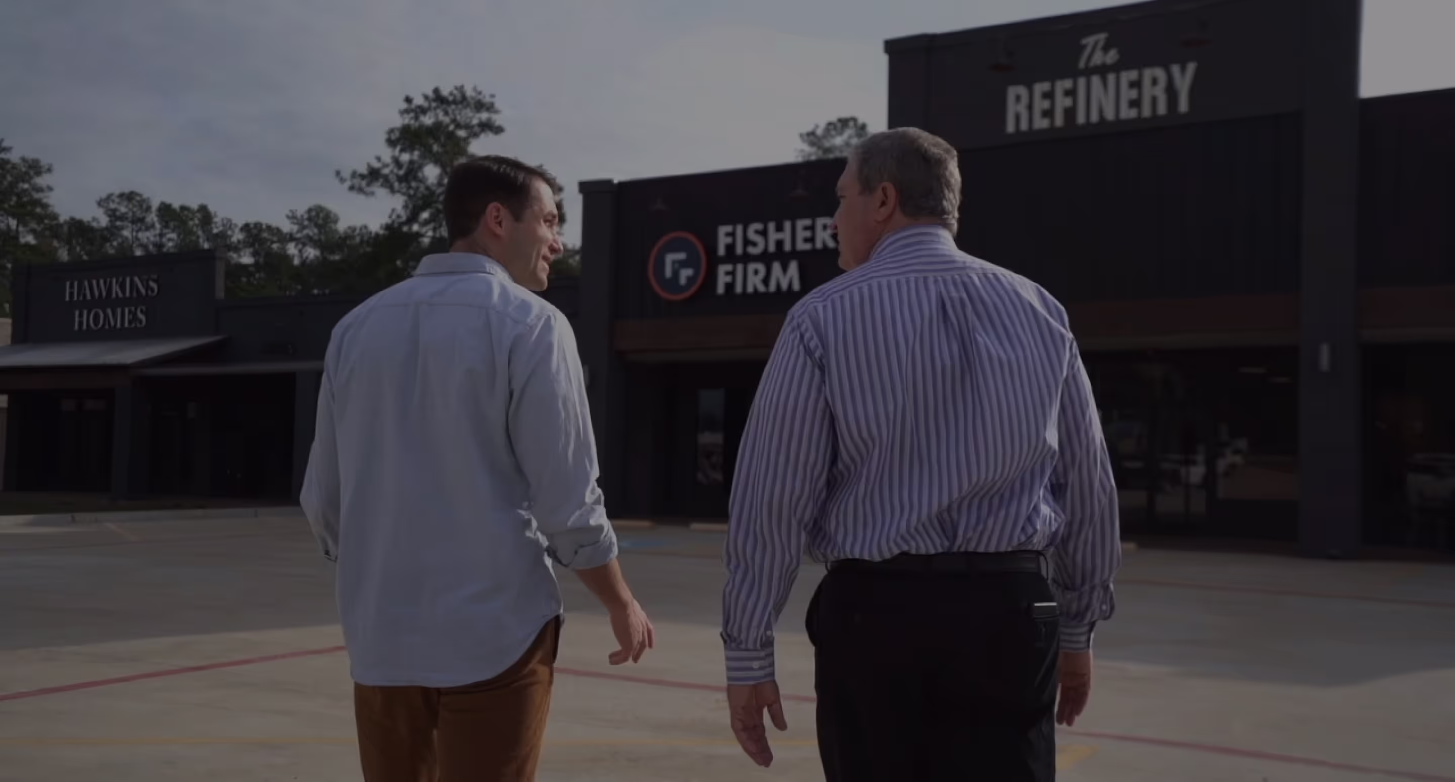 Jefferson Fisher talking to a man