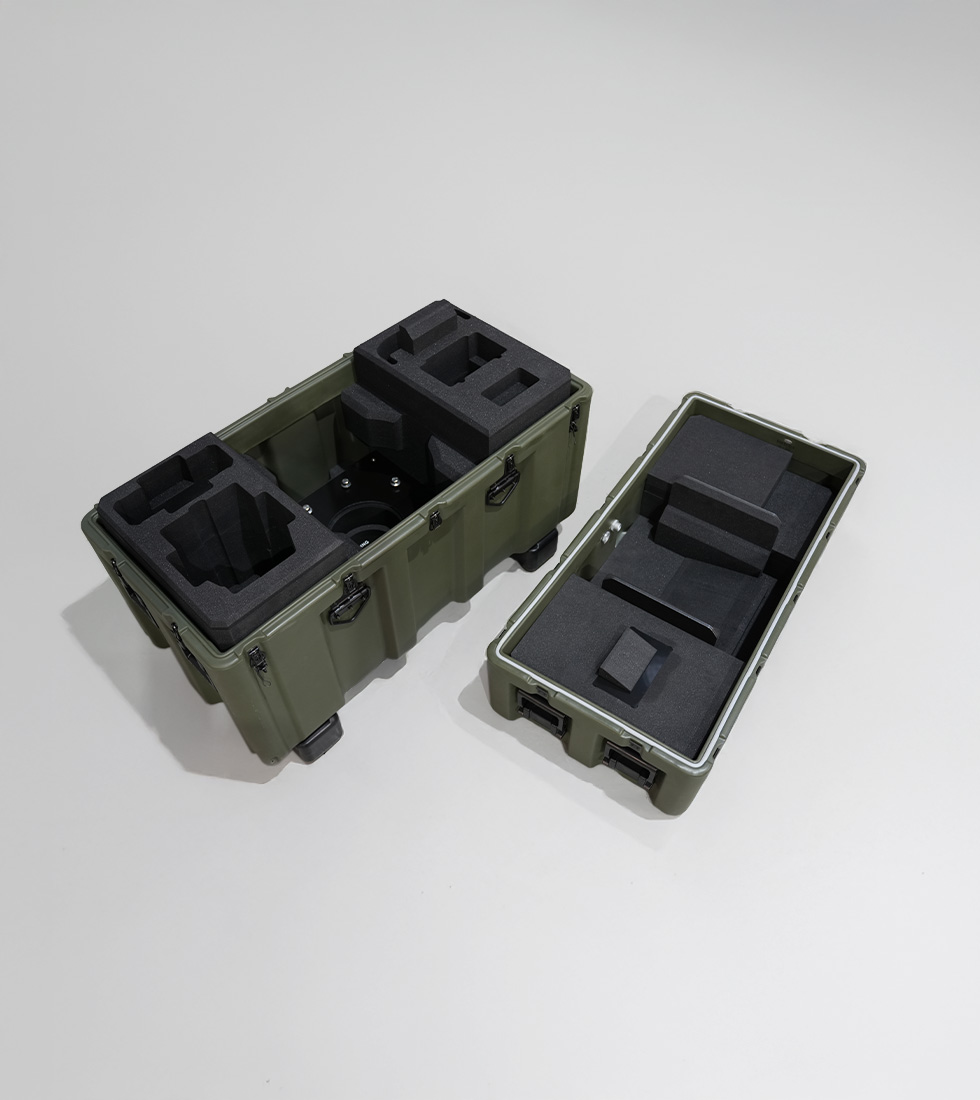 Custom internal foam layout in opened Peli-Hardigg case showing base and lid design