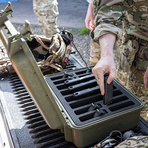 Custom foam case designed to hold and protect handgun magazines during military operations