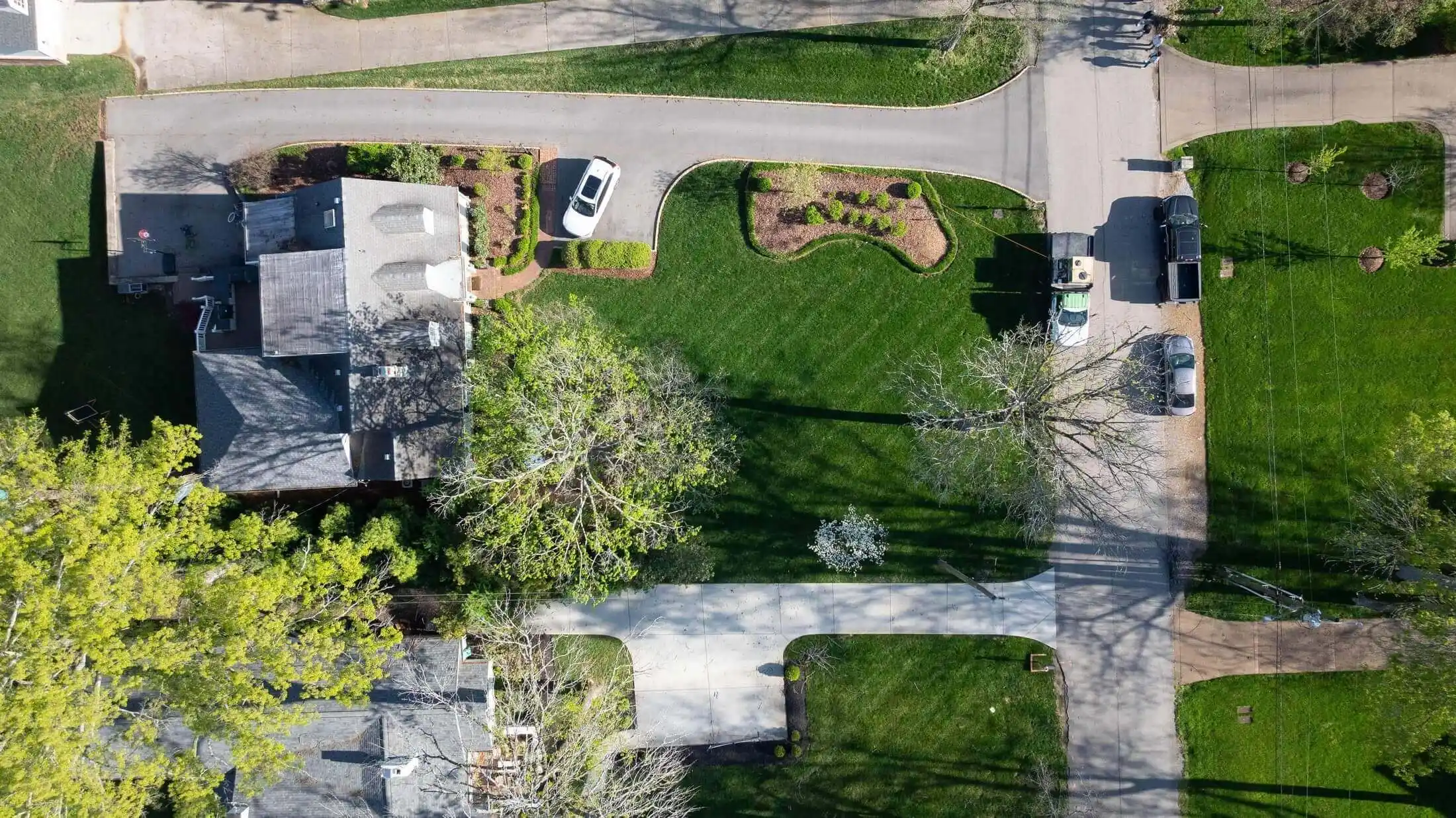 Aerial view of cemetery grounds with well-maintained grass areas and monuments serviced by Veragreen