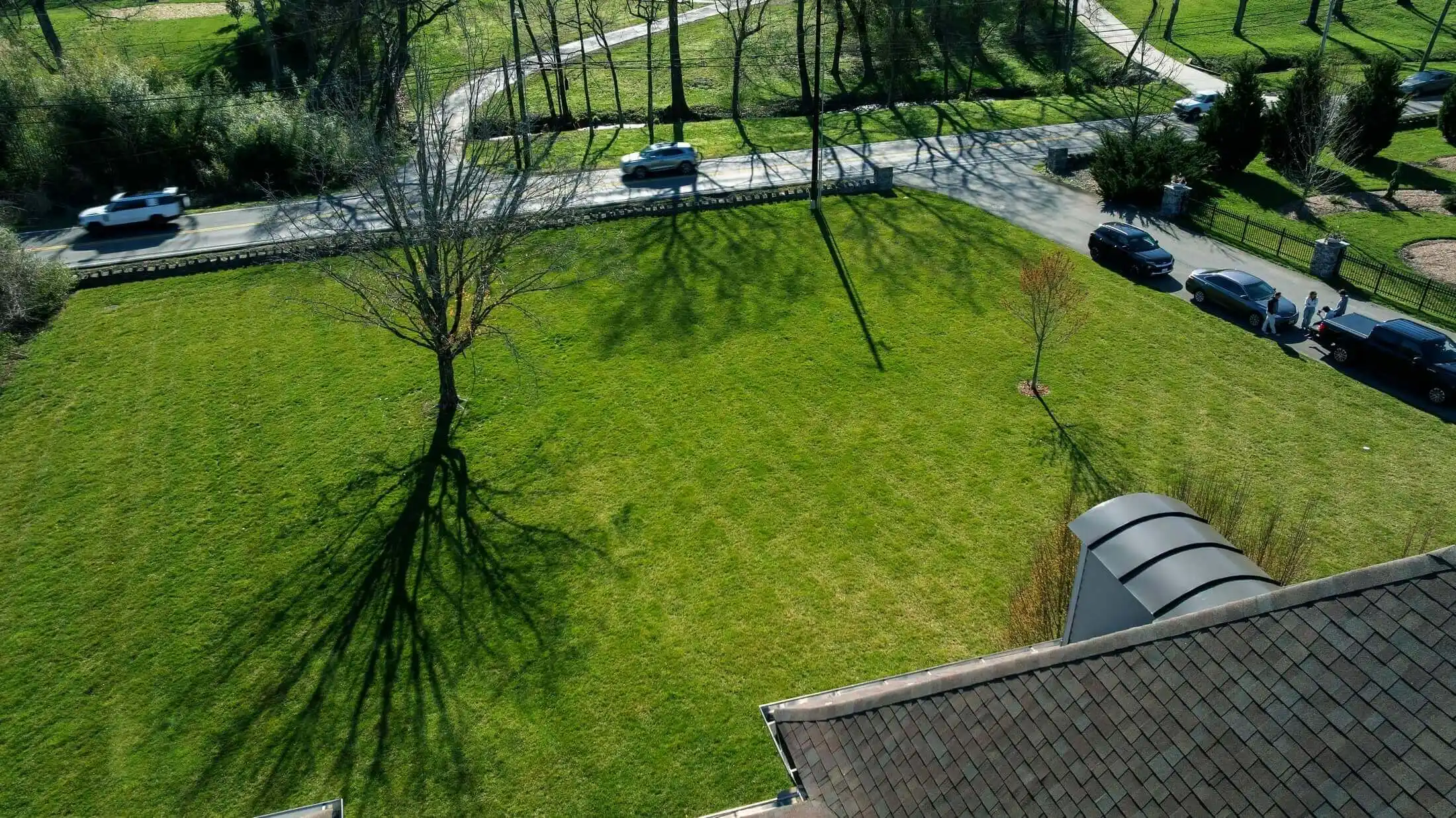 Aerial view of maintained property featuring professional lawn care and comprehensive grounds maintenance by Veragreen