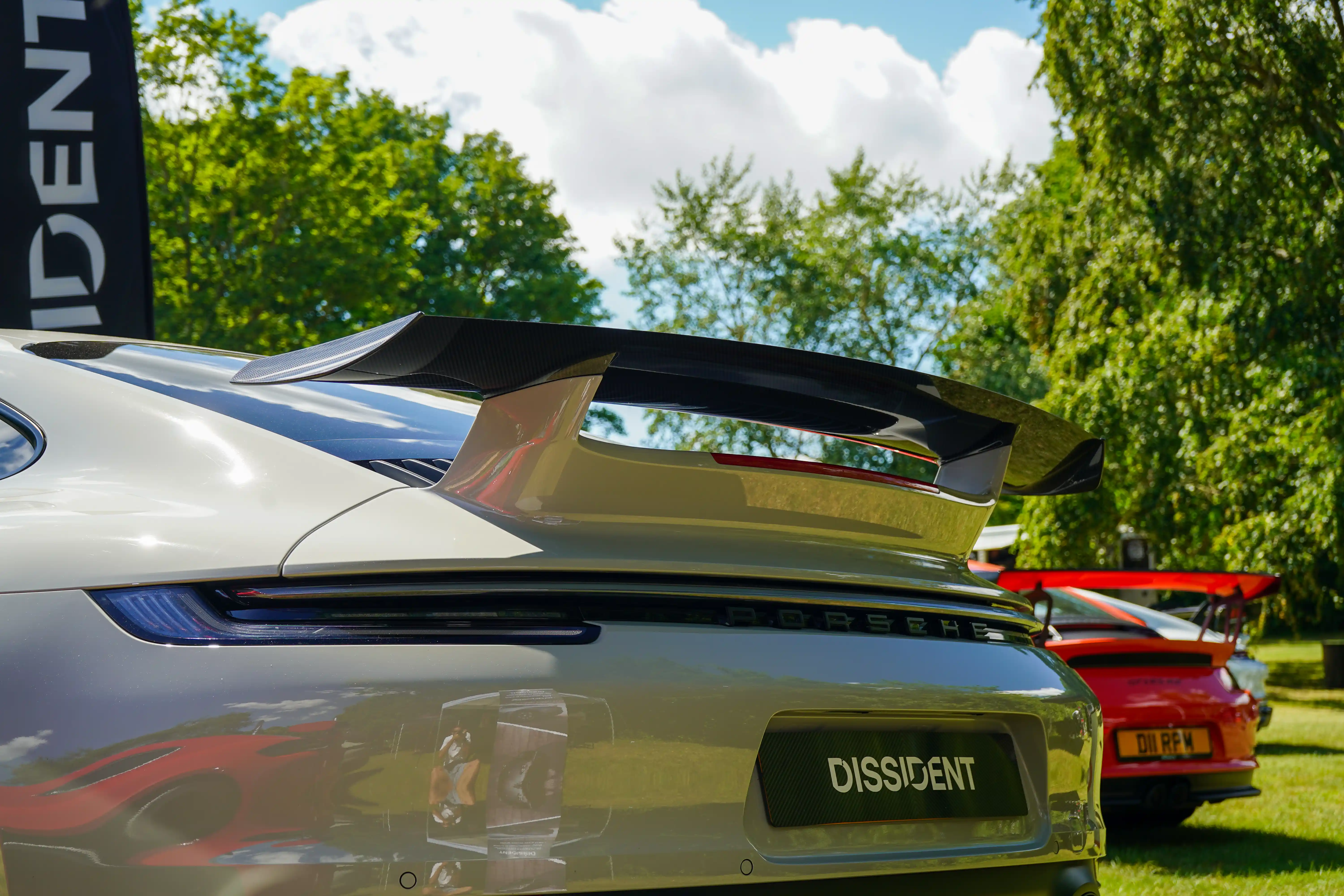 Dissident carbon fibre rear wing blade fitted to a Porsche 992 aerokit wing base