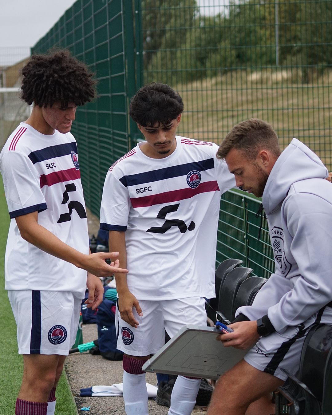 Soccer player shaking hands in ground | select generation FC