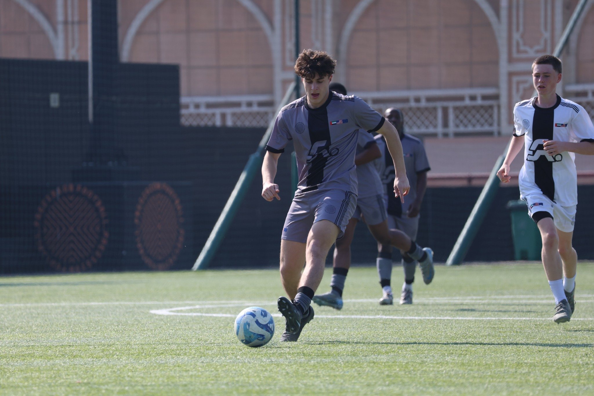 soccer players cuddle | Select Generation soccer players