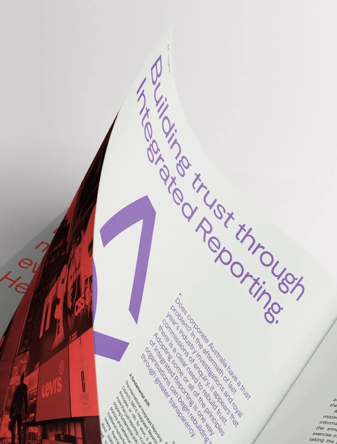 Open magazine page titled ‘Building trust through Integrated Reporting’ with purple text and a large number one.