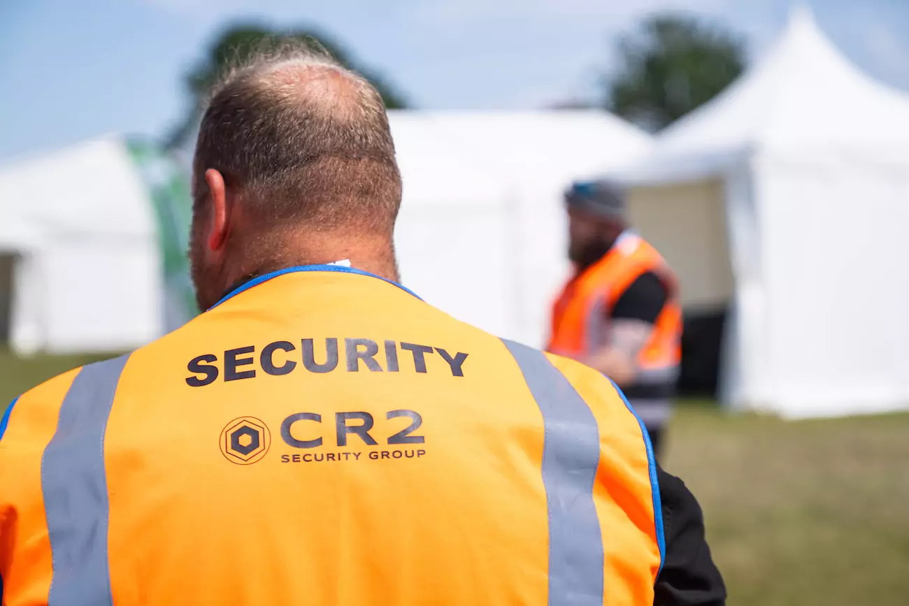 A CR2 security guard providing security services at a UK festival. 