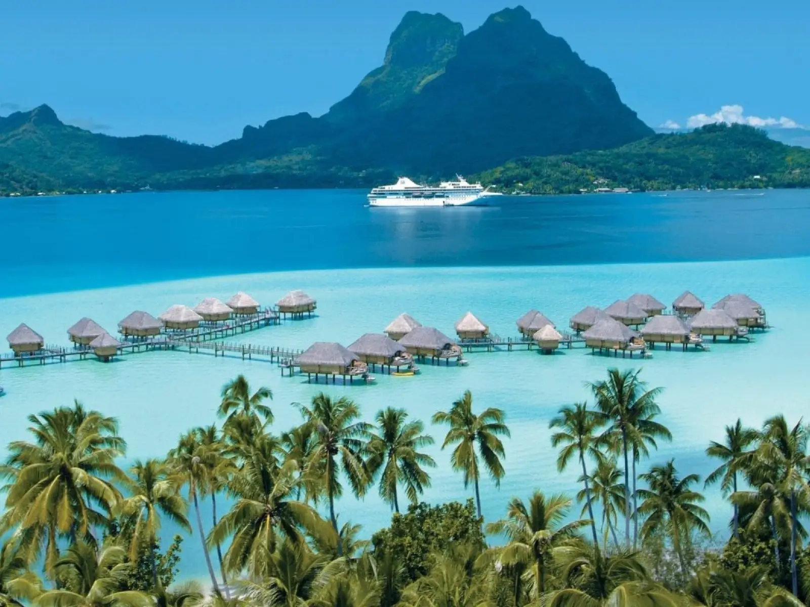 Bora Bora overwater bungalows and clear lagoon
