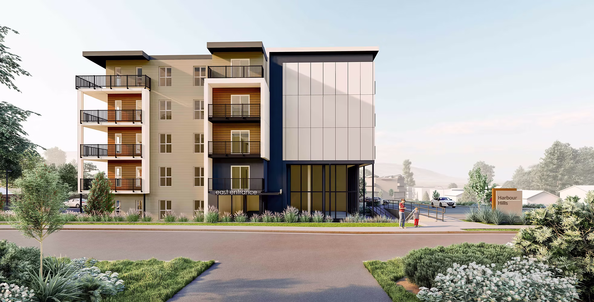Modern multi-story apartment building with balconies and landscaped entrance