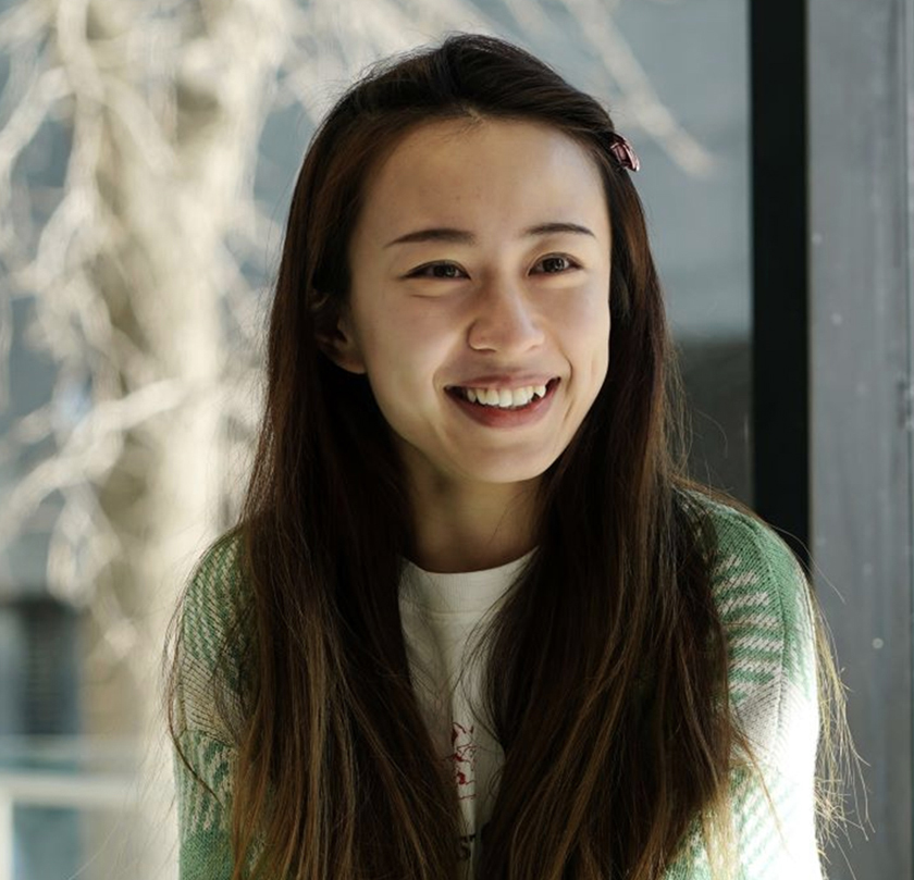 Design and Engineering Works professional woman smiling confidently in modern office