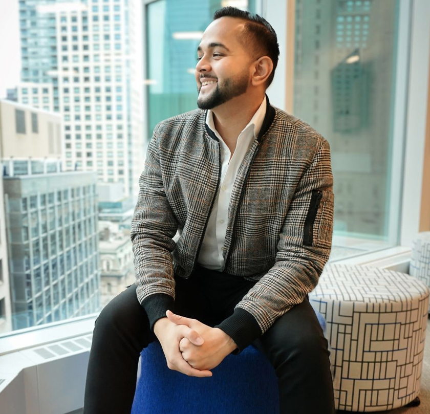 Professional engineer in modern office overlooks city skyline, Design and Engineering works together for success