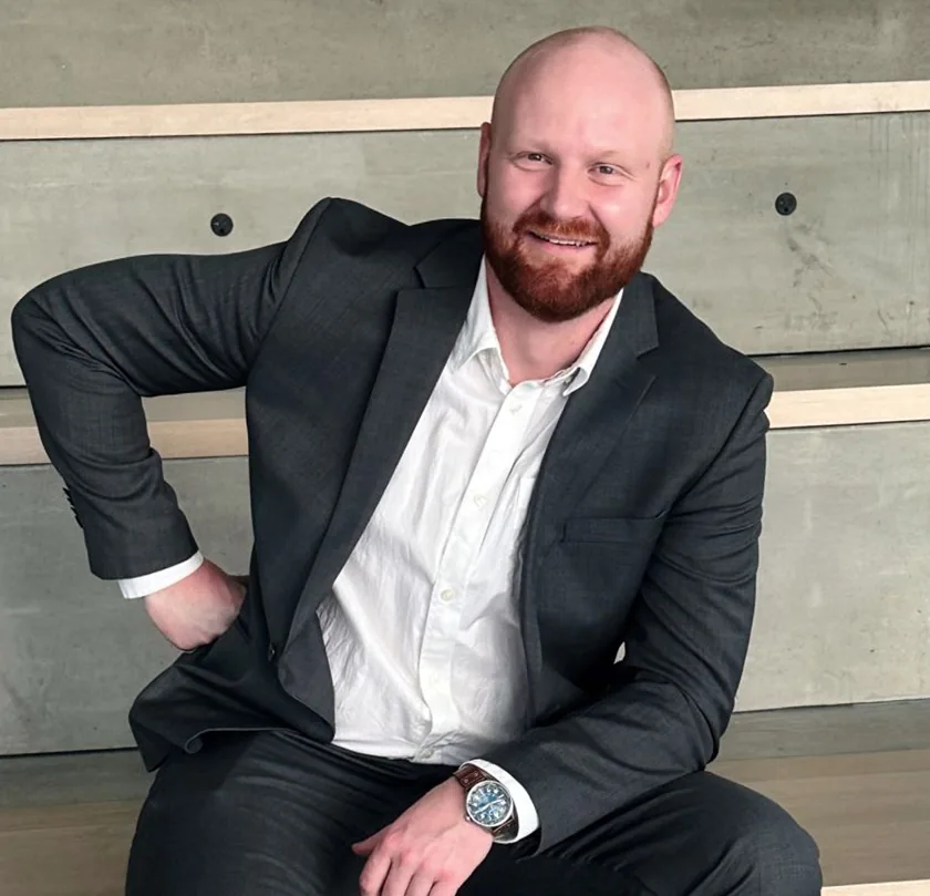 Professional portrait of man in suit. Design, Works, and Engineering expertise combined.