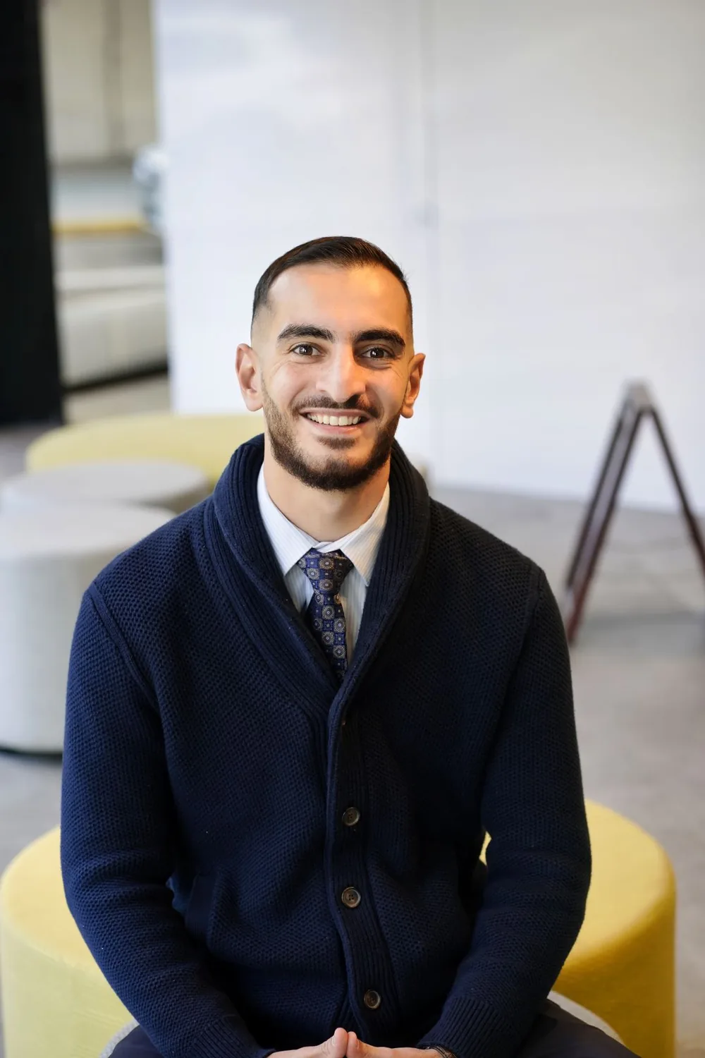 Professional portrait of smiling man in Design, Works, Engineering office environment