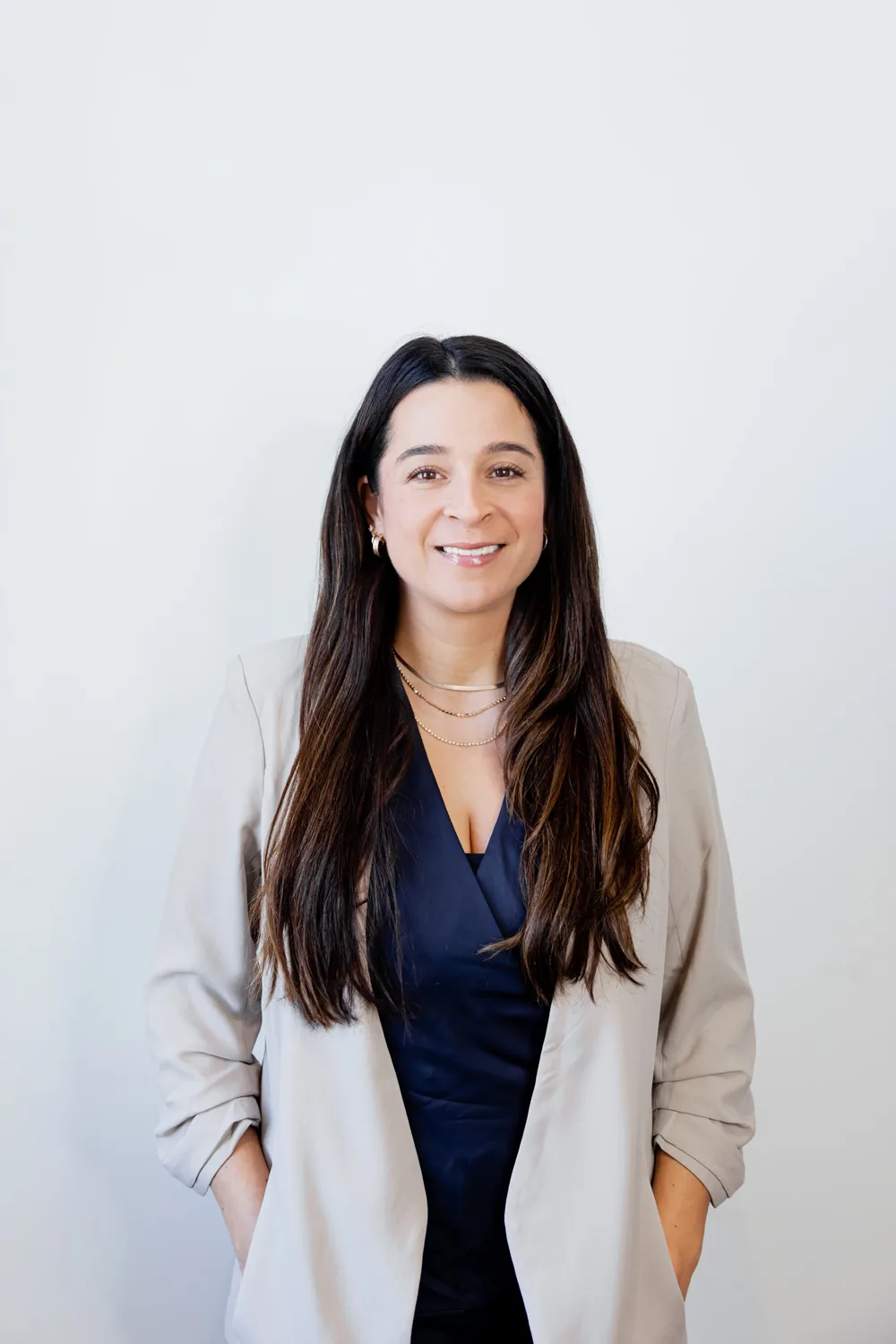 Professional portrait of woman in business attire. Design, Works, Engineering specialist headshot.