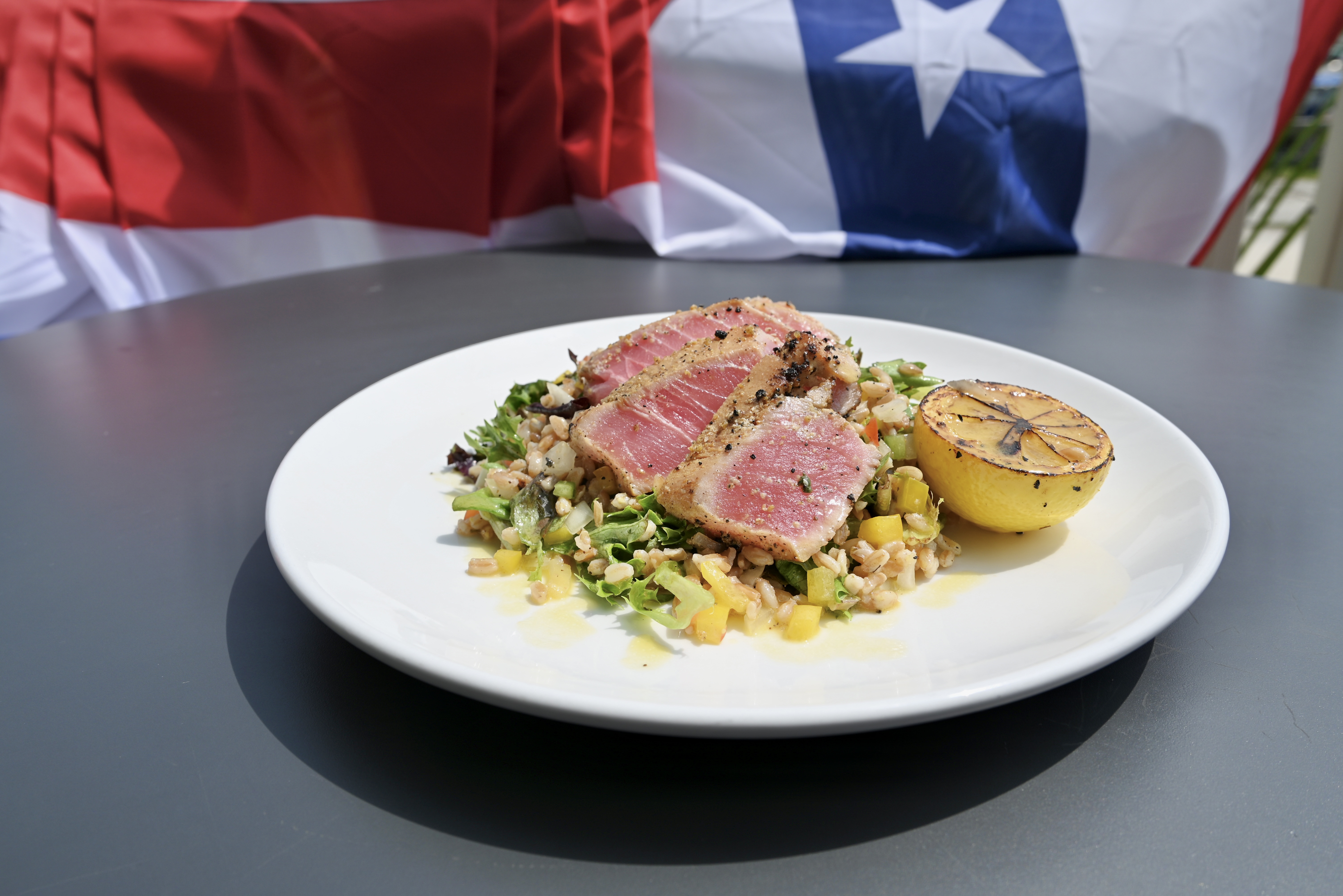 Table with wrapped utensils on top