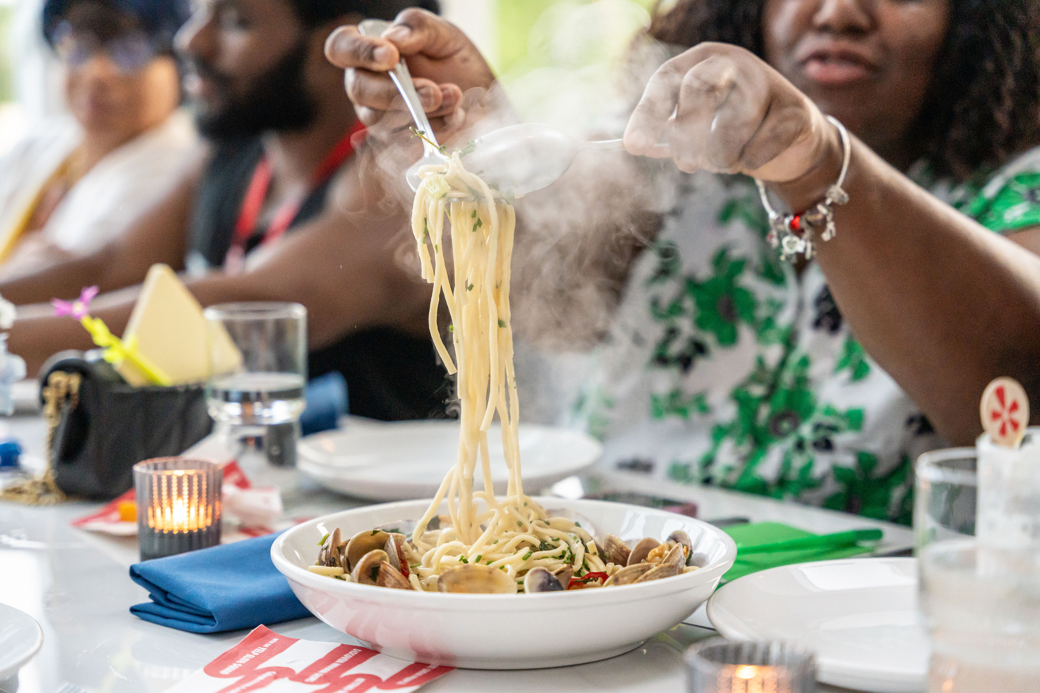 Table with wrapped utensils on top