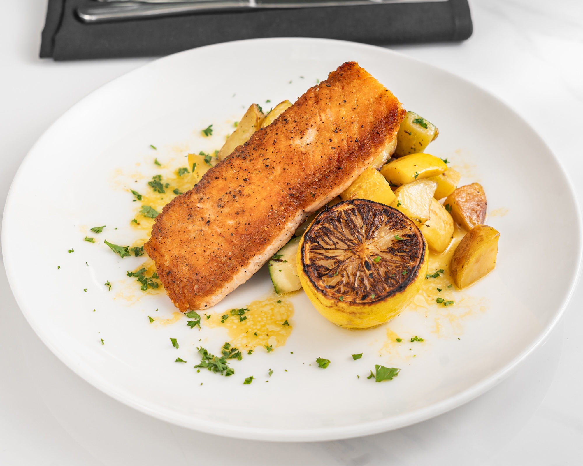 Plate of Dakota's On The Cove's Seared Salmon