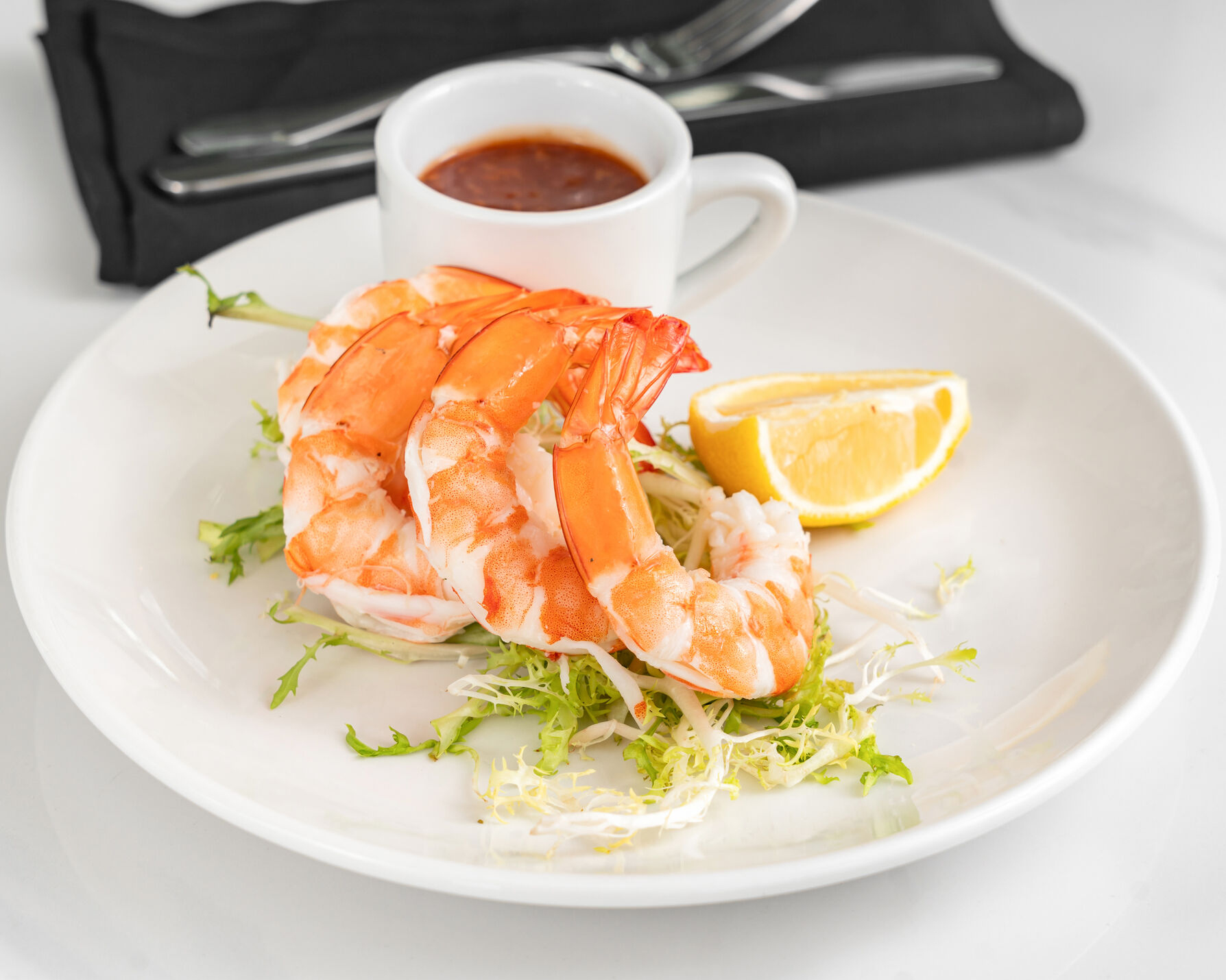 Plate of shrimp cocktail.