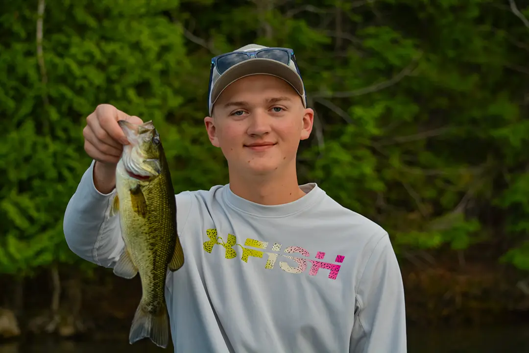 Matt Gustavel Holding A Fish Happy