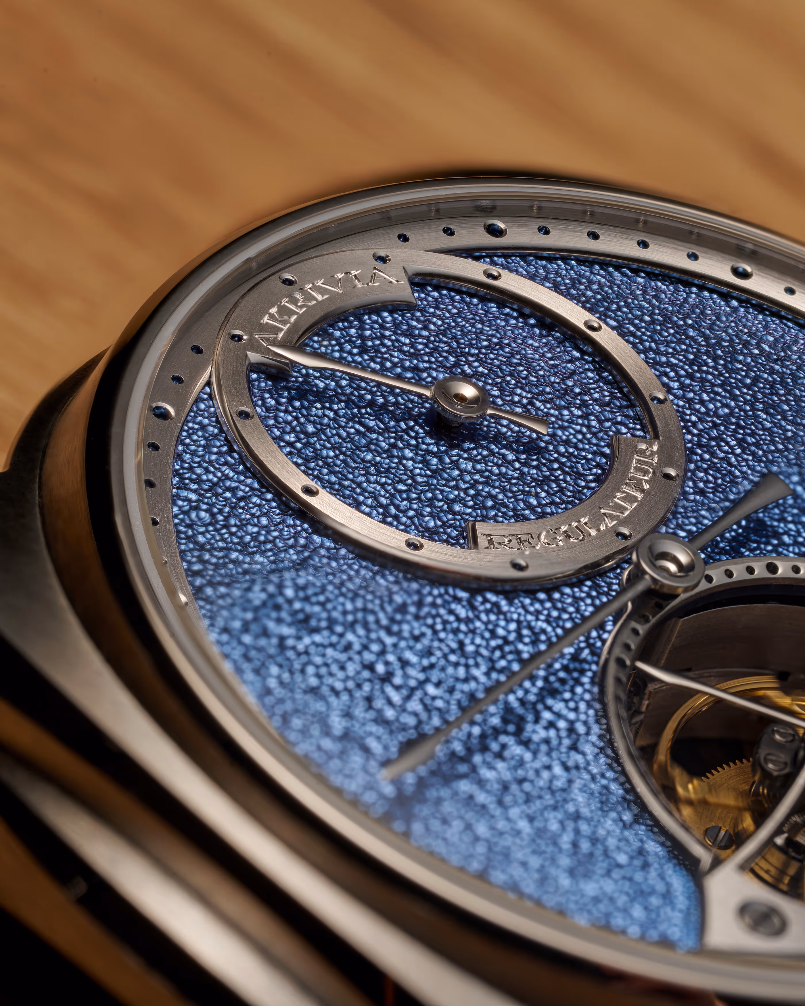 Close-up on the blue hand-hammered dial of the AK-04 Tourbillon Regulator Akrivia
