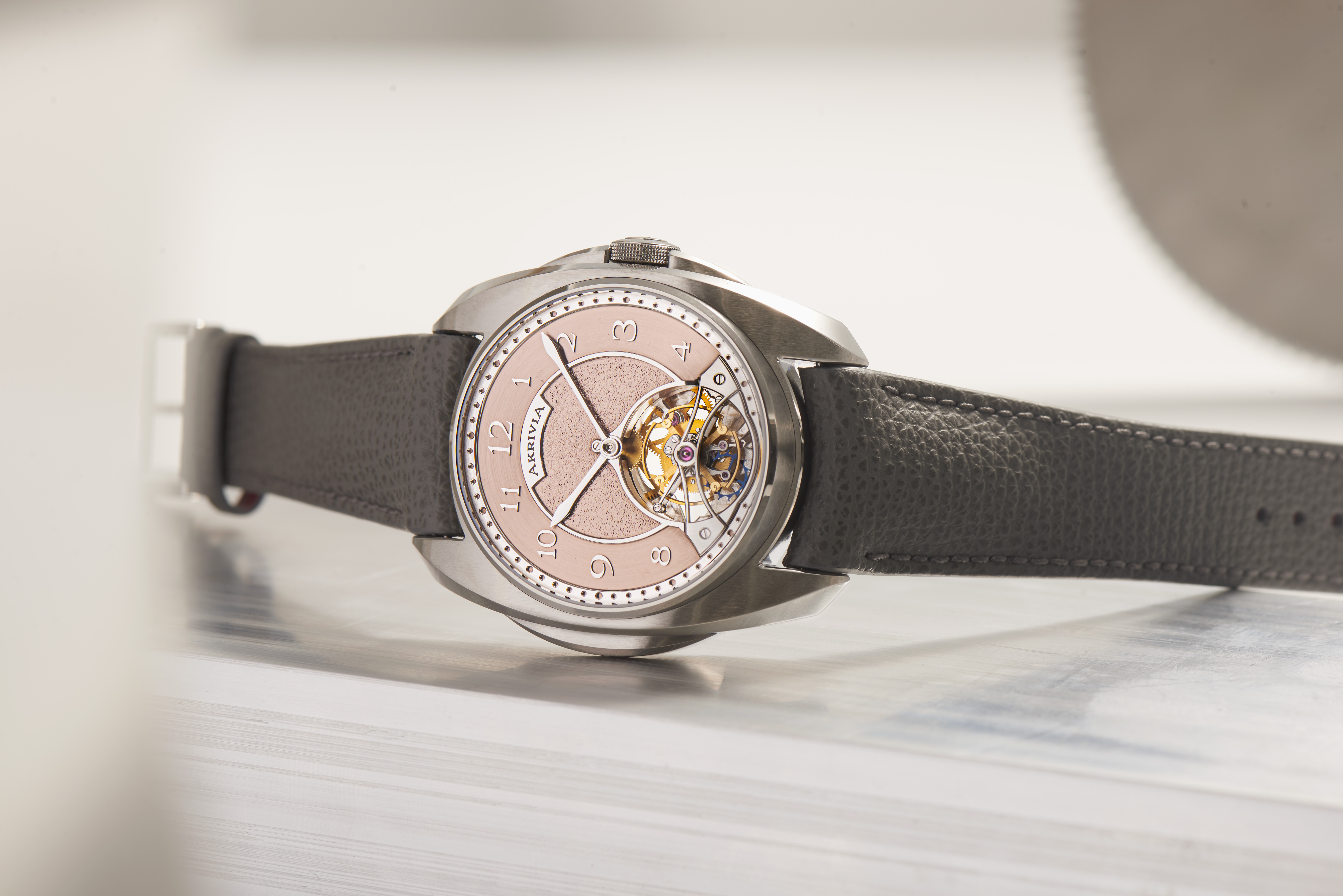 AK-05 watch with light pink dial by the independant swiss watchmaker Rexhep Rexhepi, Akrivia 