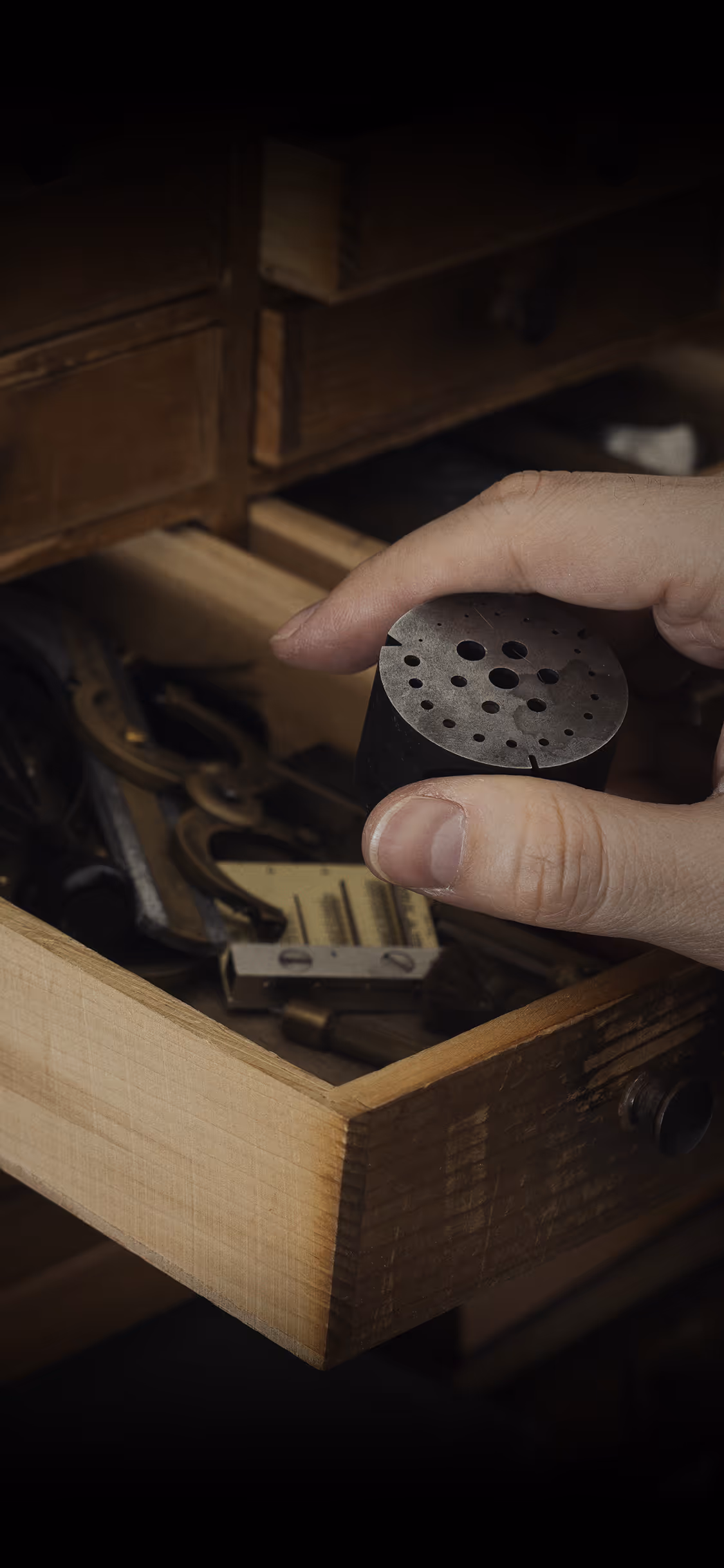 Inside the Rexhep Rexhepi cabinet: traditional watchmaking tools and components