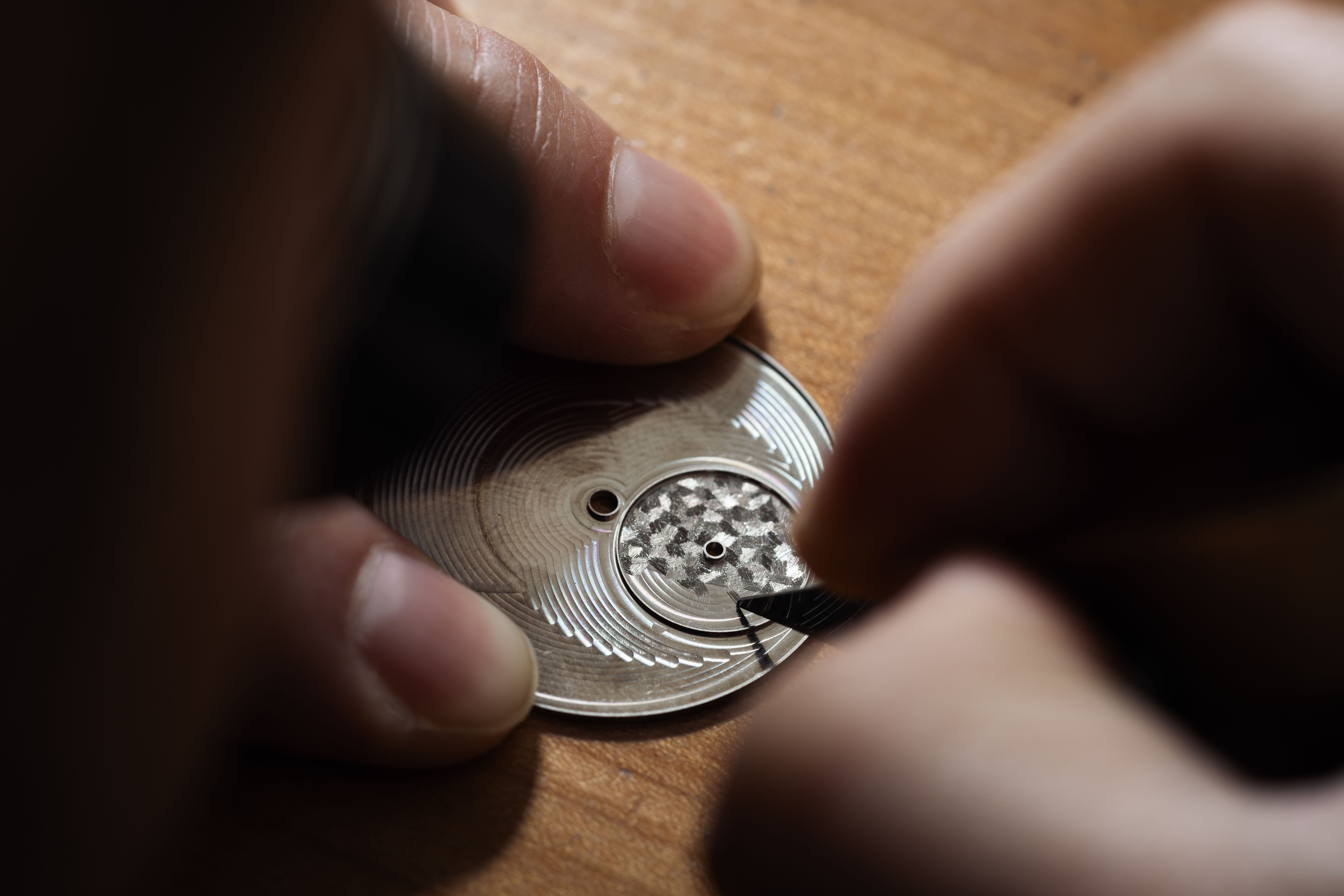 Rexhep Rexhepi hand-engraving the RRCC II subdial with a knife