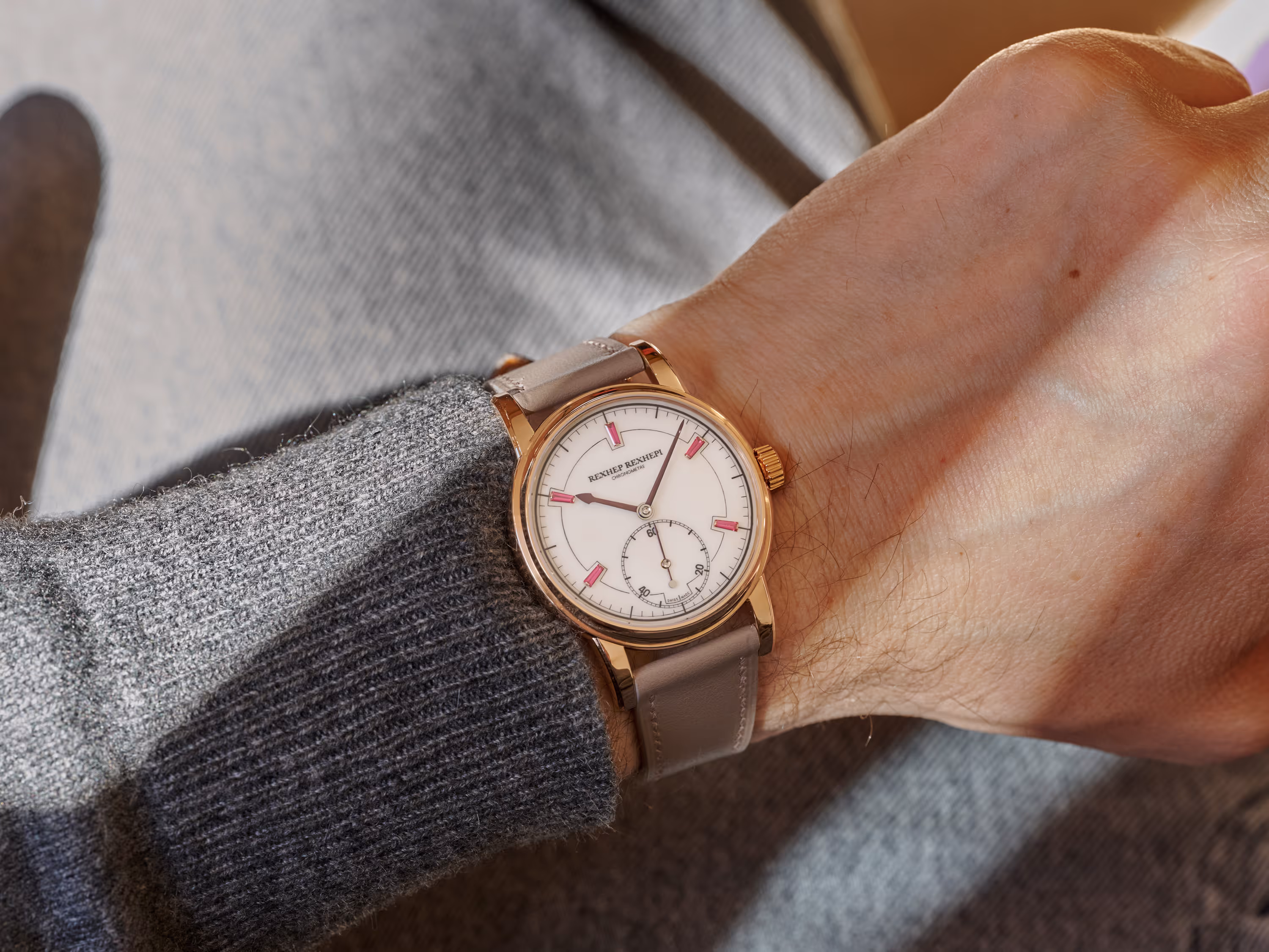 Wrist shot on Rexhep Rexhepi of the limited edition of the RRCC II with ivory-colored enamel dial and ruby markers