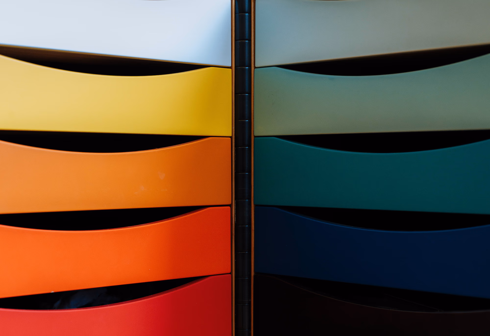 Finn Juhl colorful curved drawers arranged in two vertical columns