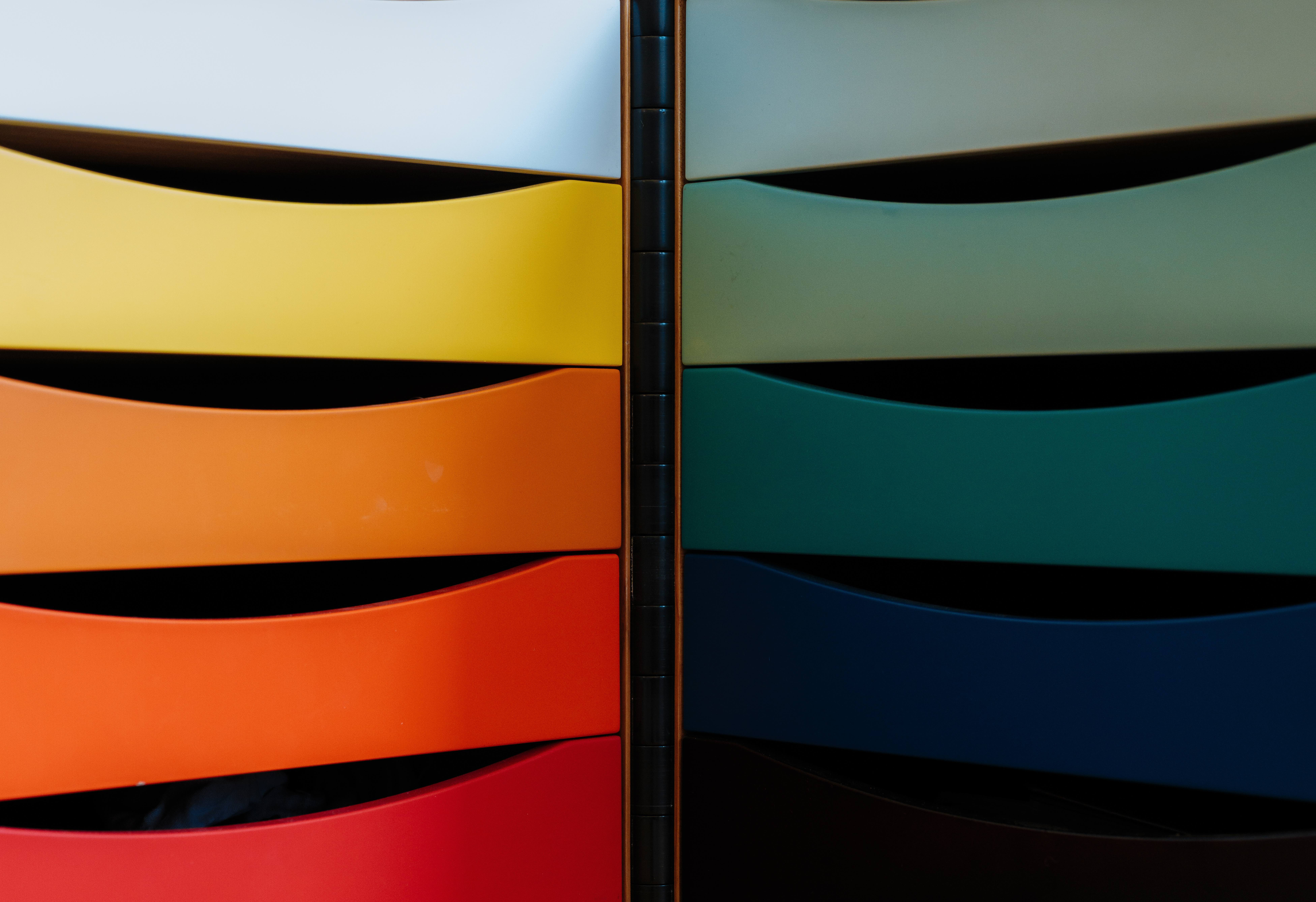 Finn Juhl colorful curved drawers arranged in two vertical columns