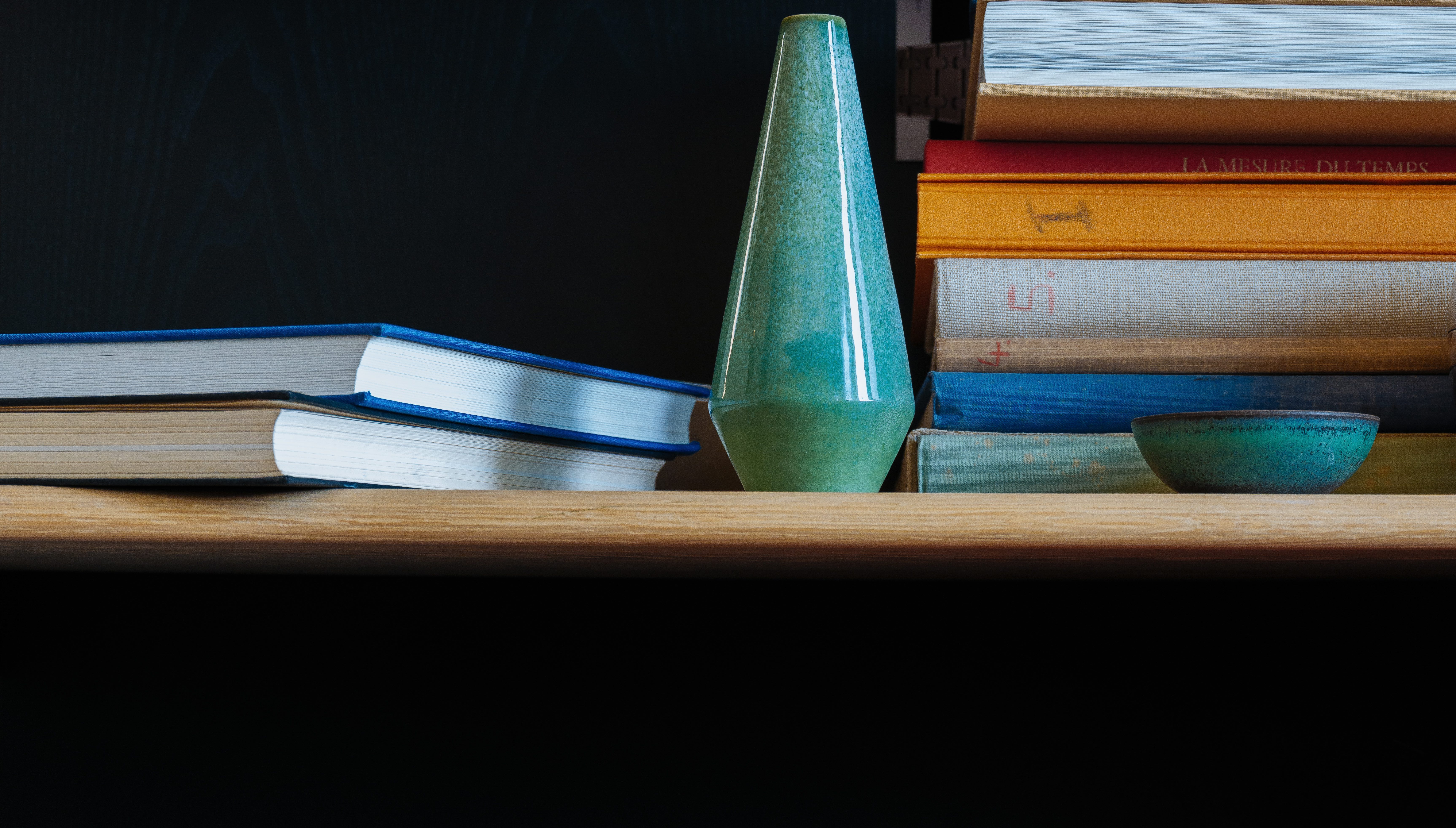 Books and ceramique blue vase